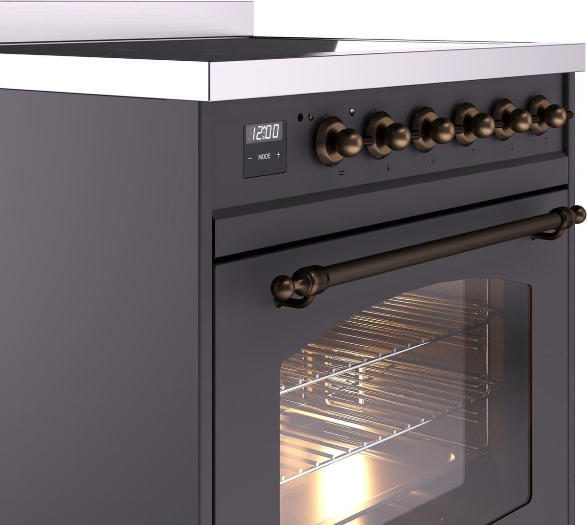 Freestanding electric induction range top control panel with bronze knobs and oven door handle.
