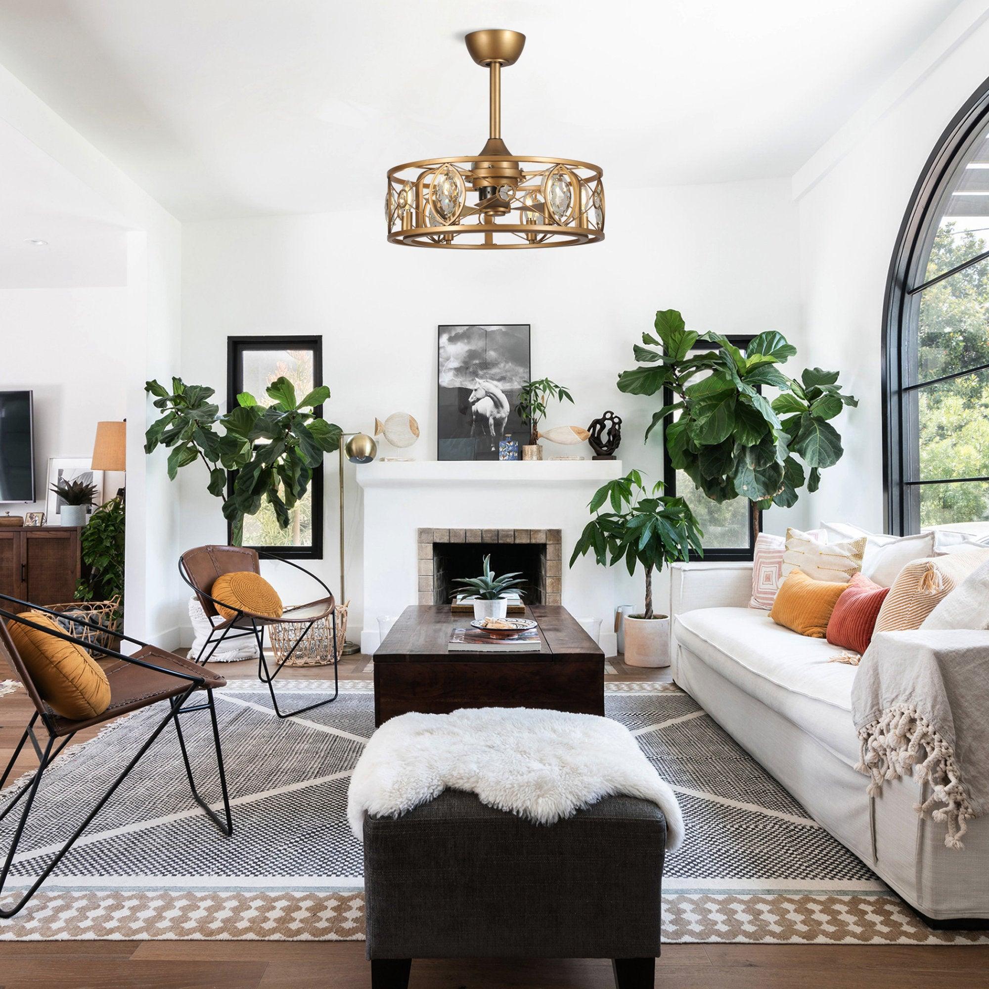 Gold ceiling fan chandelier with crystal-style accents hanging from the ceiling