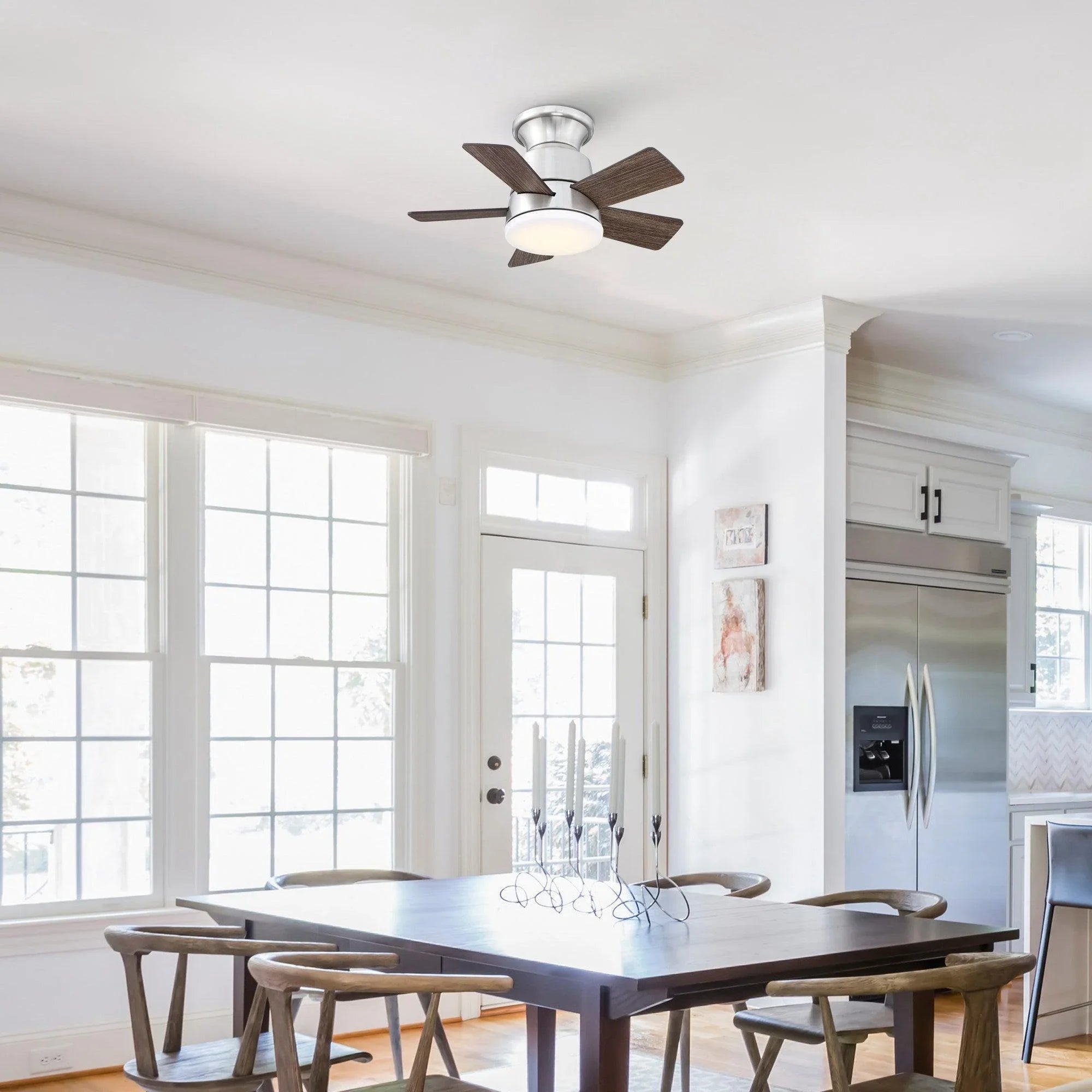 Brushed nickel flush-mount ceiling fan with 5 wood blades and frosted light dome