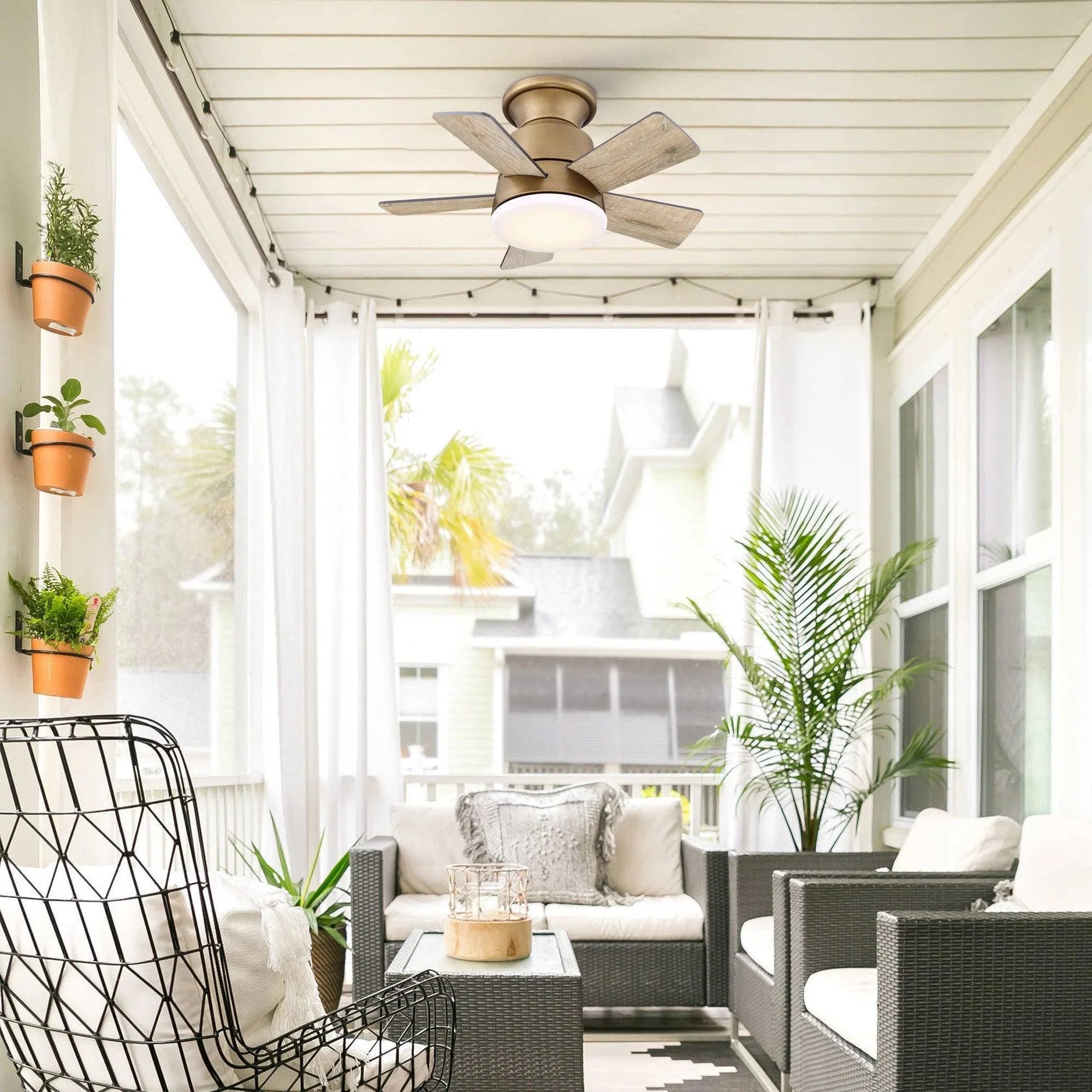 Ceiling flush mount fan with reversible blades and frosted light, brushed brass finish