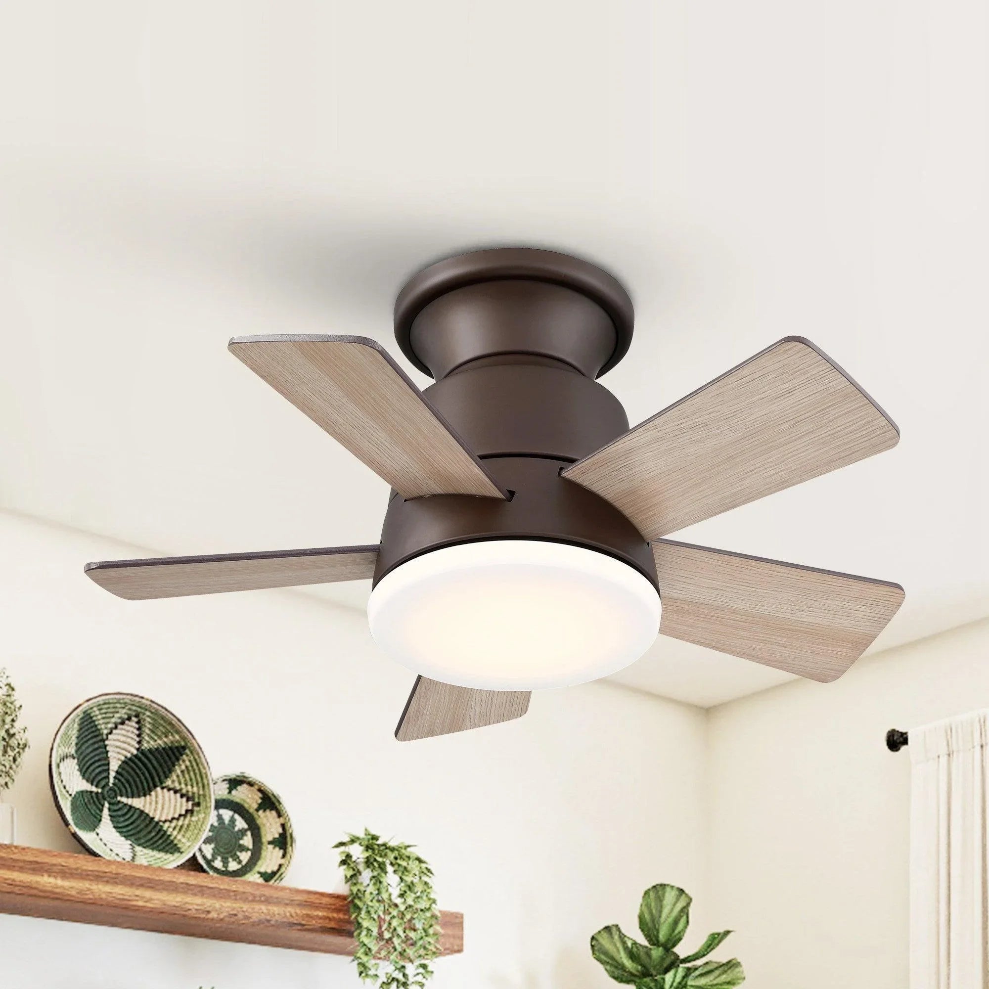 Farmhouse flush-mount ceiling fan with dark bronze housing, wood blades, and frosted light