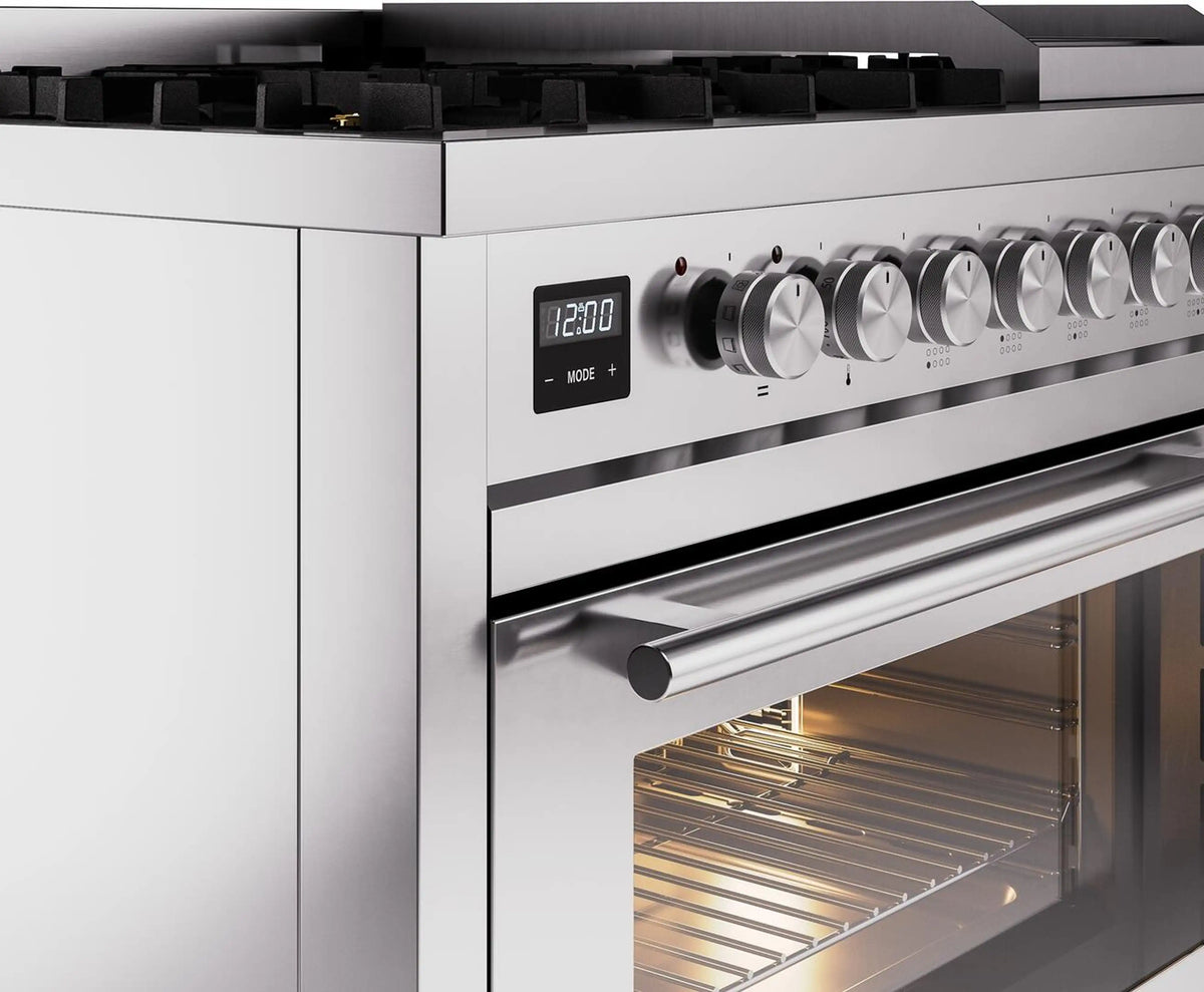 Stainless steel control panel with digital clock, knob dials, and oven handle