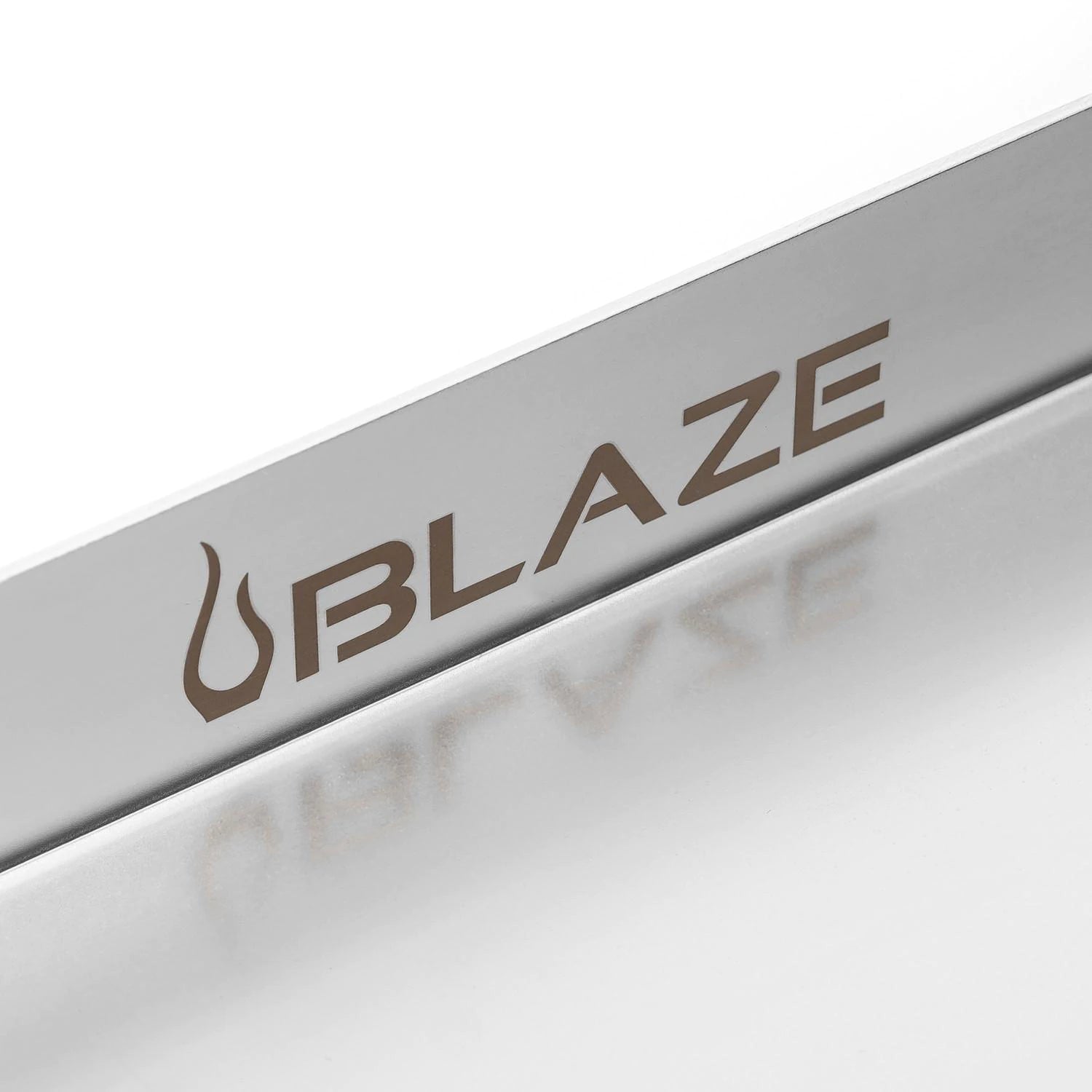 Stainless griddle plate with UBLAZE branding on front edge, 24-inch size