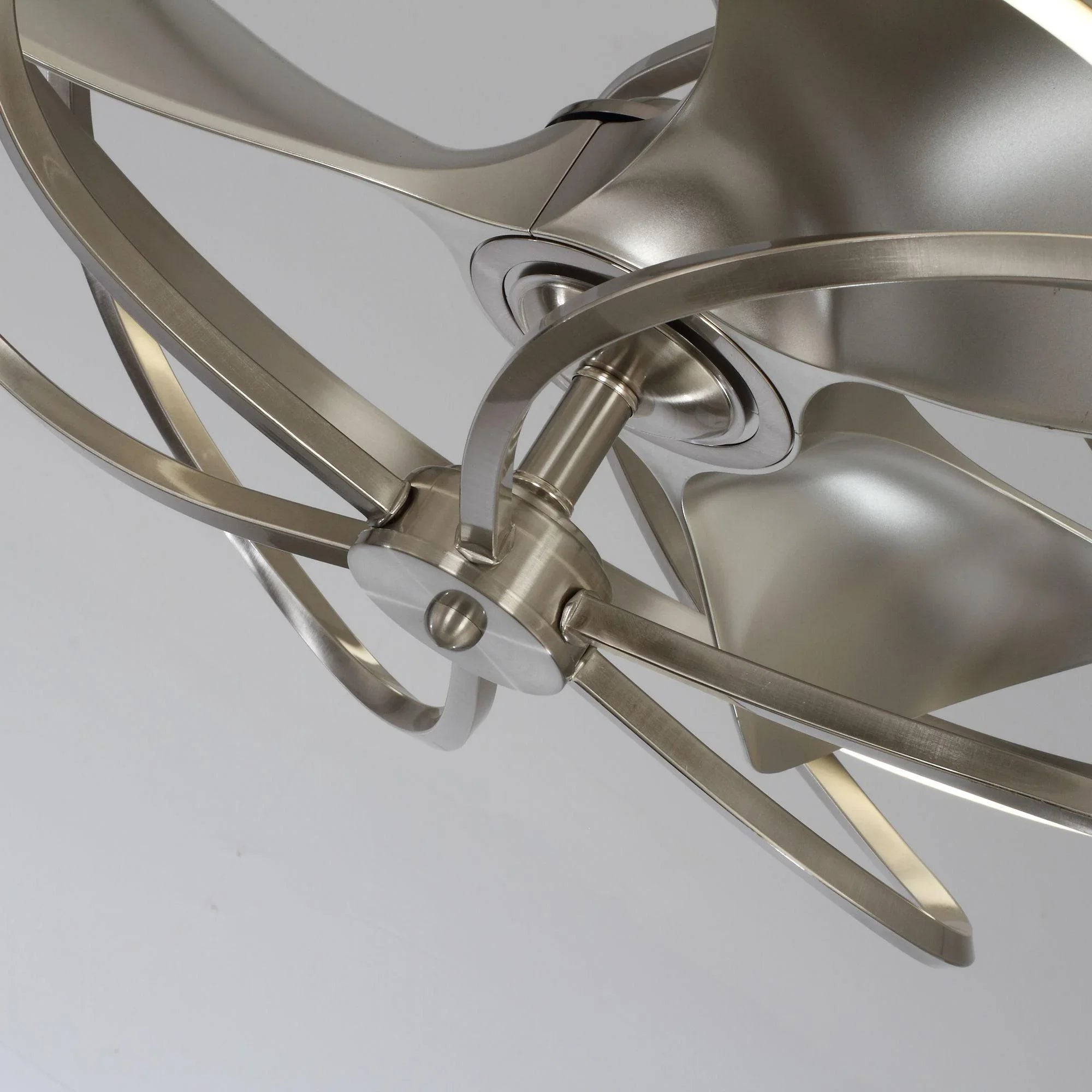 Close-up of brushed nickel ceiling fan blade and motor hub assembly