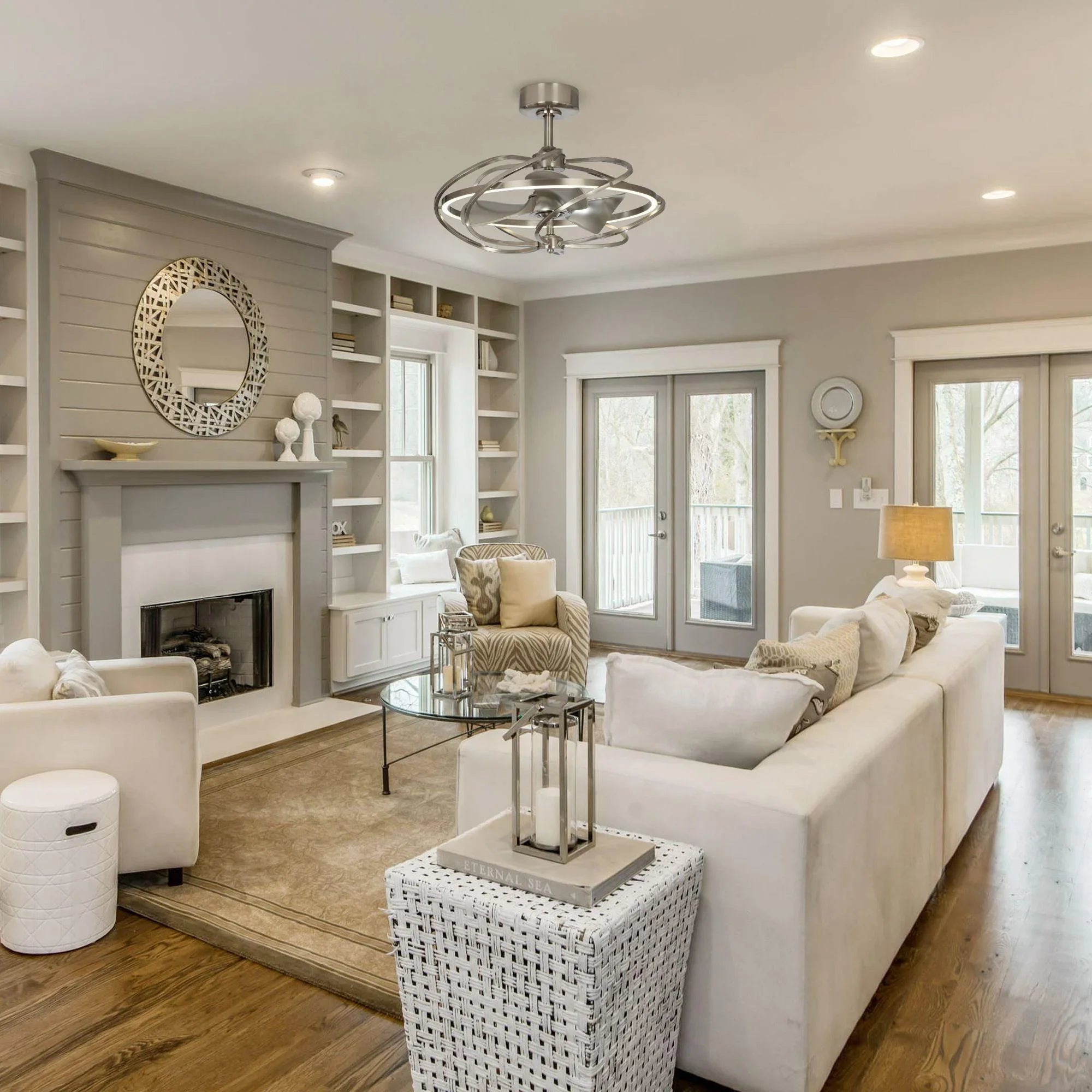 Brushed nickel ceiling fan with integrated light installed on a home ceiling