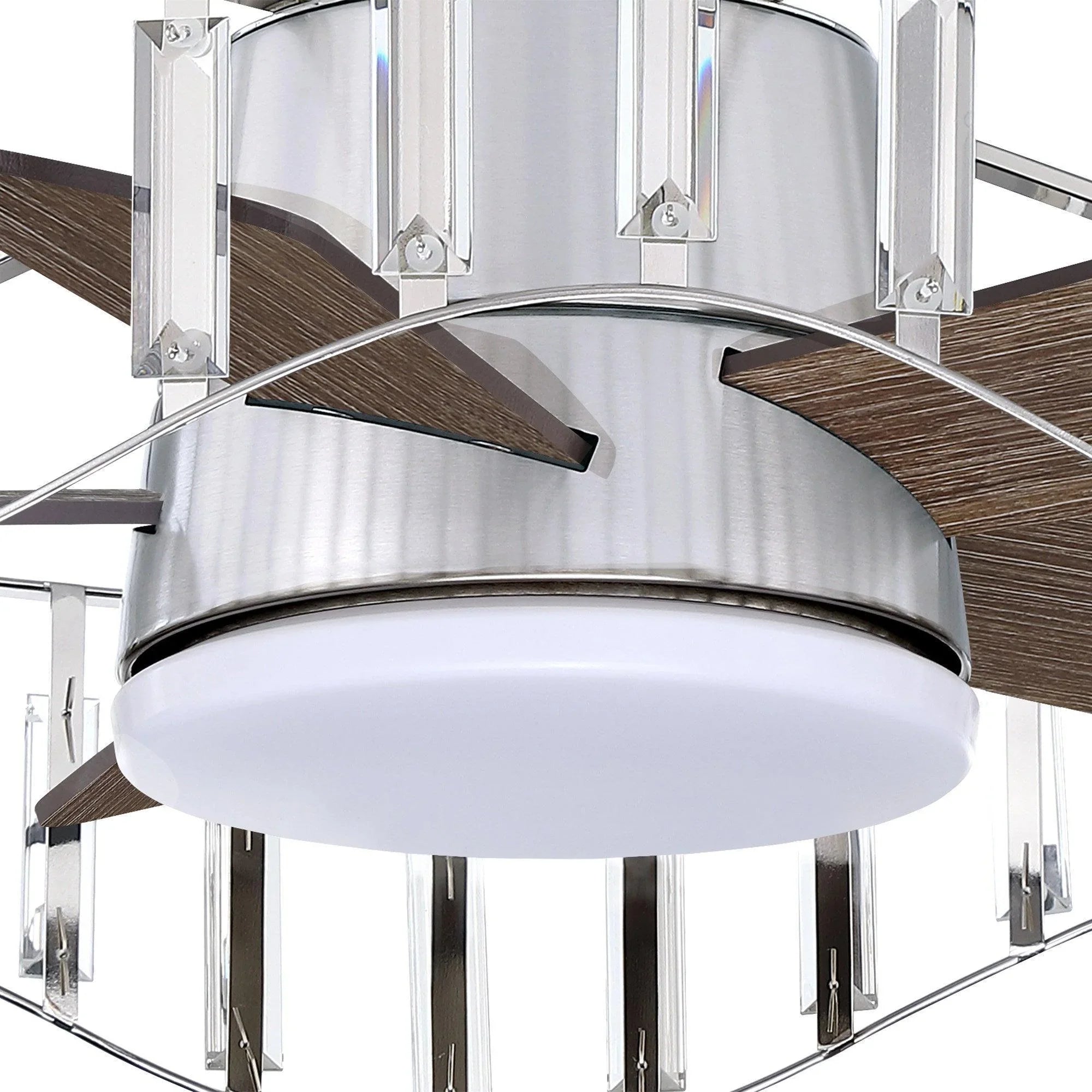 Brush nickel ceiling fan close-up with white light diffuser and dark wood-toned blades