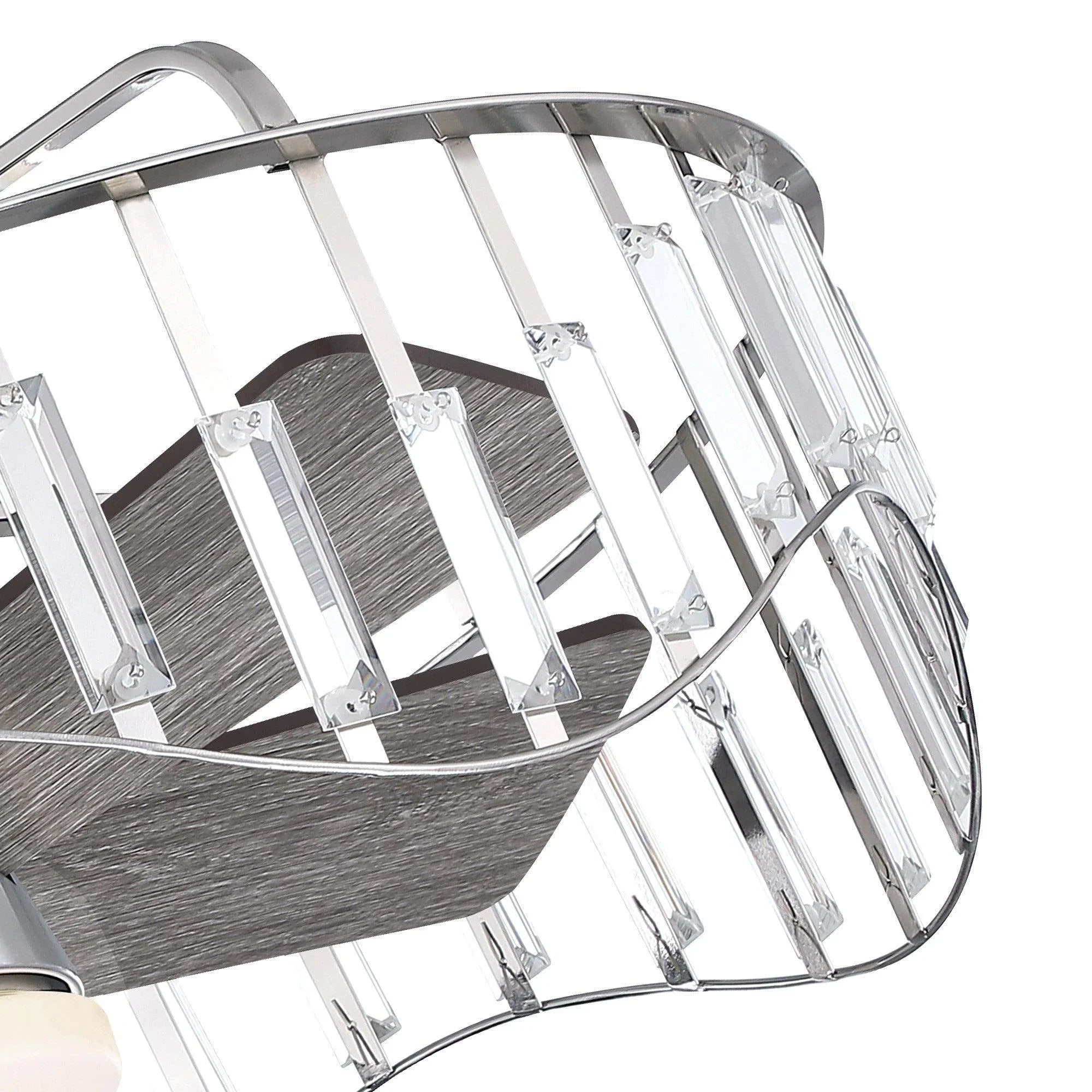 Ceiling fan angled view with chrome cage, dark blades, and white light diffuser