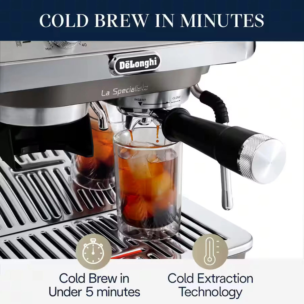 Silver espresso machine dispensing cold brew into a glass under the group head