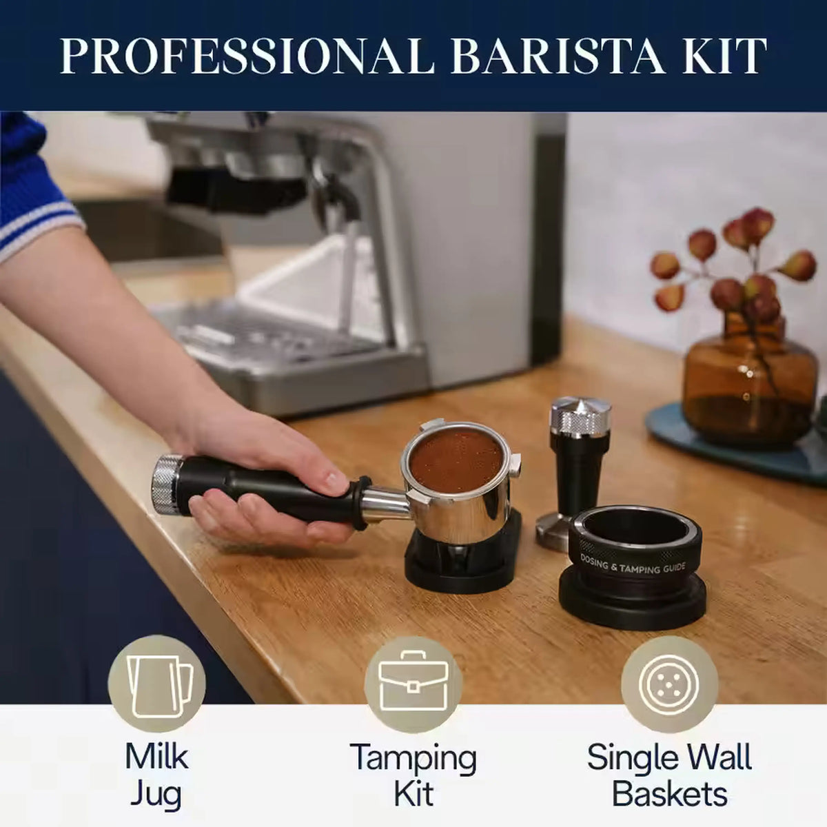 Silver espresso machine with included barista accessories: milk jug, tamper, single wall baskets