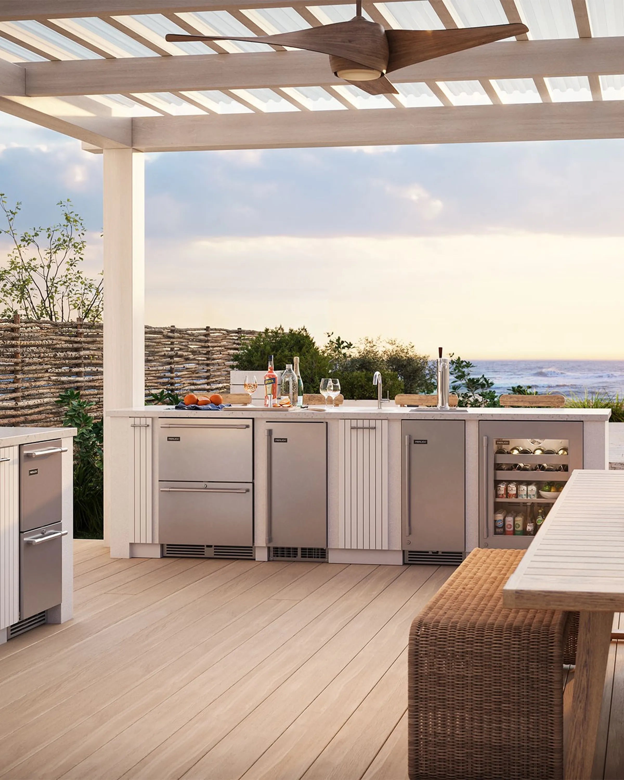 Undercounter dual zone refrigerator/freezer drawers with stainless doors, built-in outdoor patio