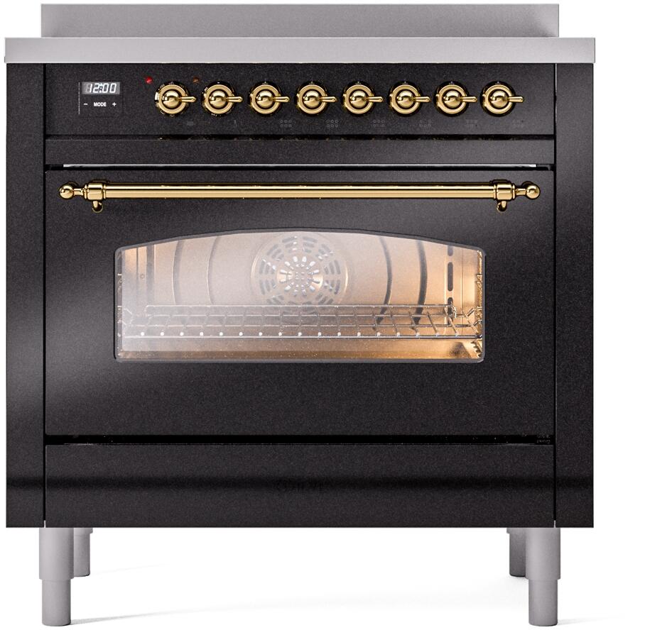 Freestanding induction range with glossy black door and brass-trimmed oven window