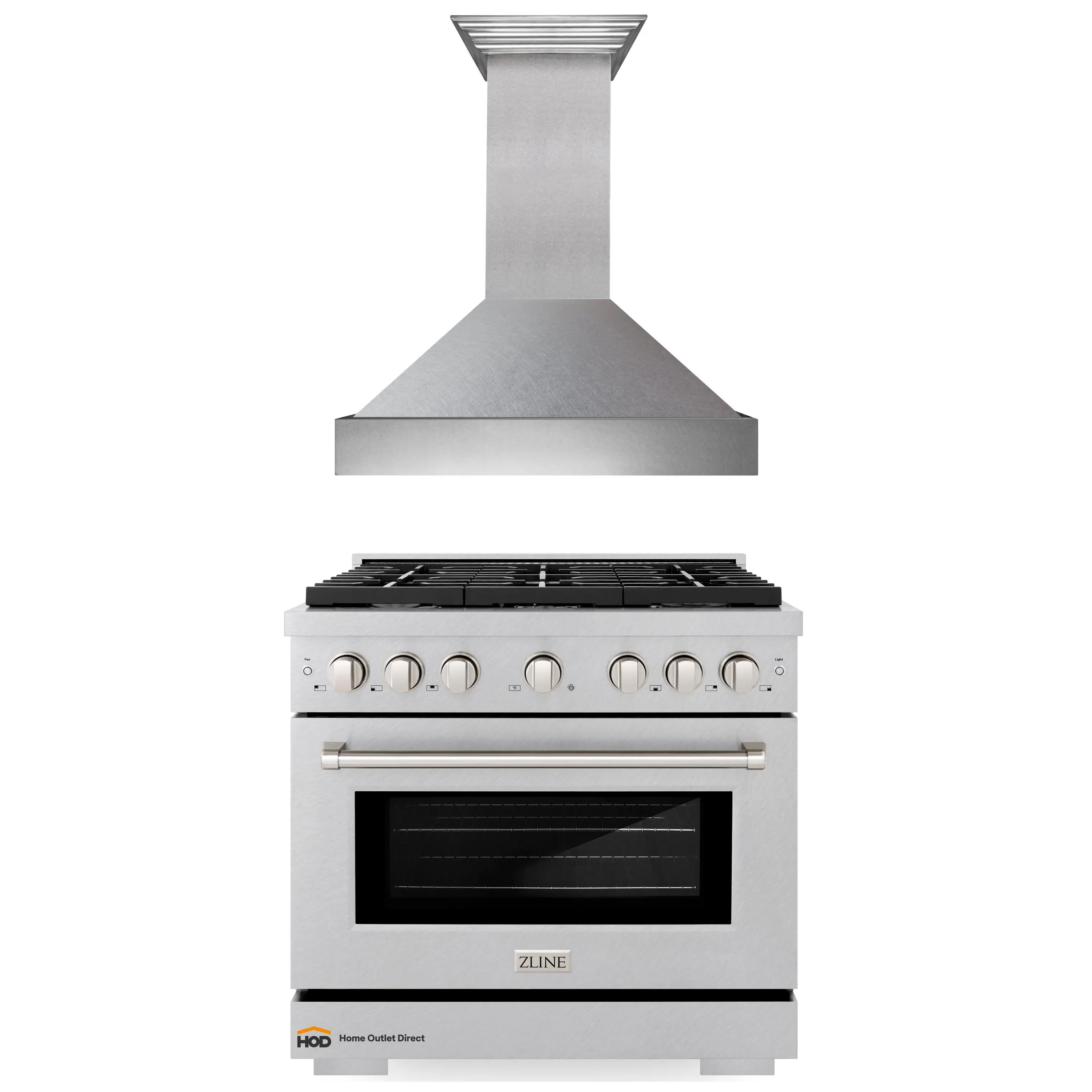 Wall mount range hood with stainless chimney and white gas range beneath