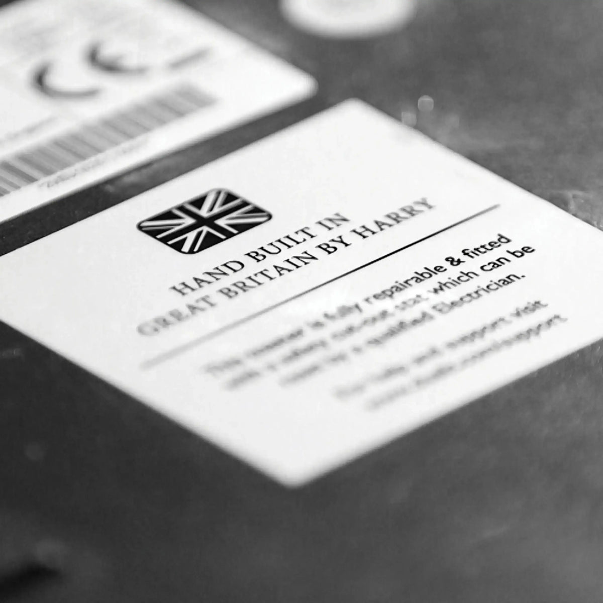 Dualit toaster base label stating hand built in Britain by HARRY