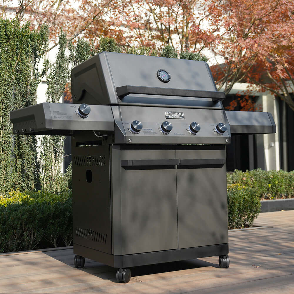 Black propane gas grill on caster wheels with control knobs and closed lid