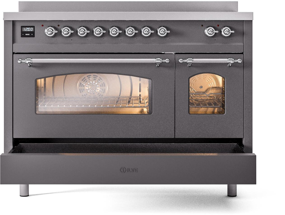 Matte graphite electric induction range with chrome knobs and viewing windows over ovens