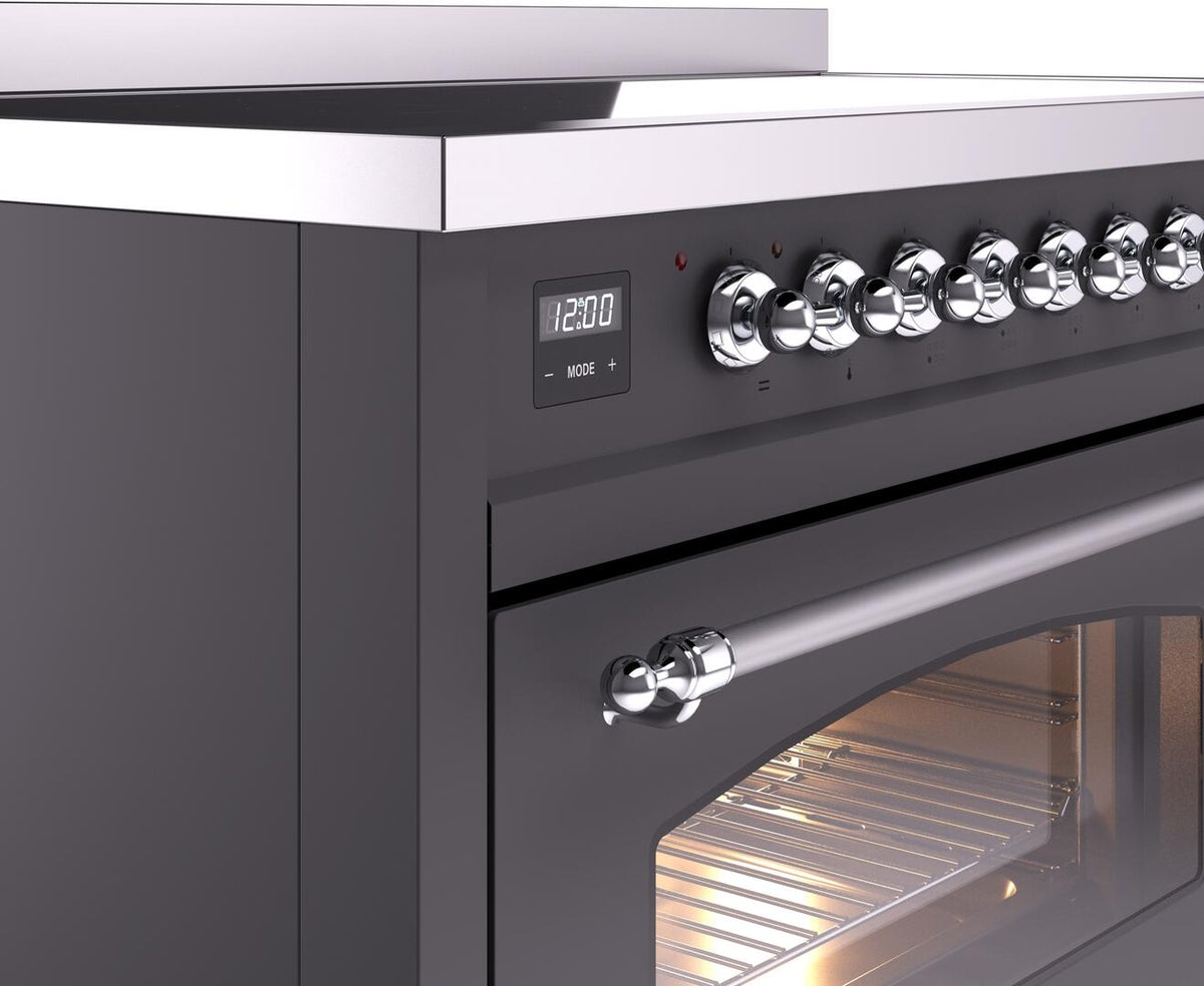 Chrome control knobs and digital display on matte graphite electric induction range