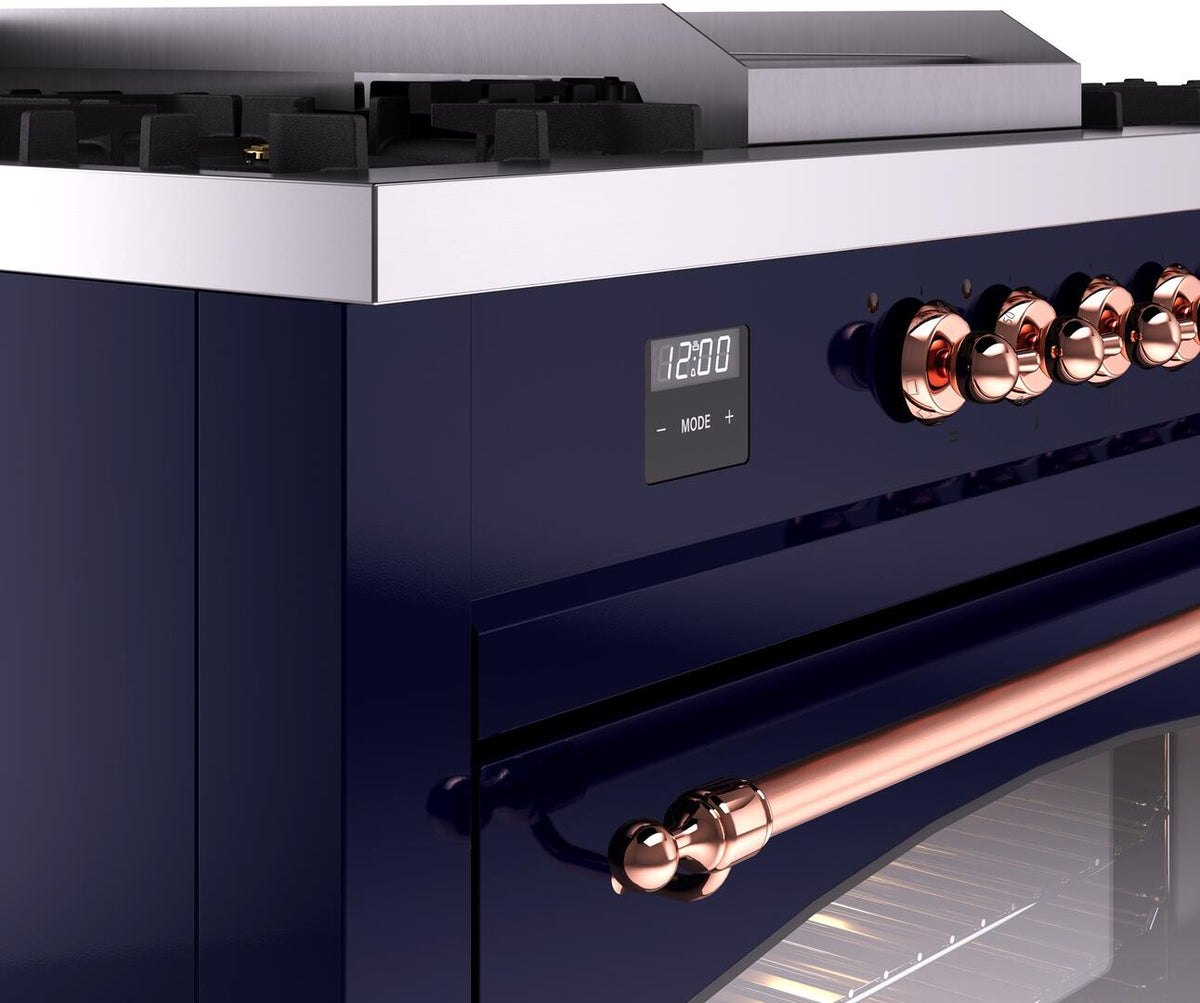 Midnight blue range control panel with copper knobs and digital display