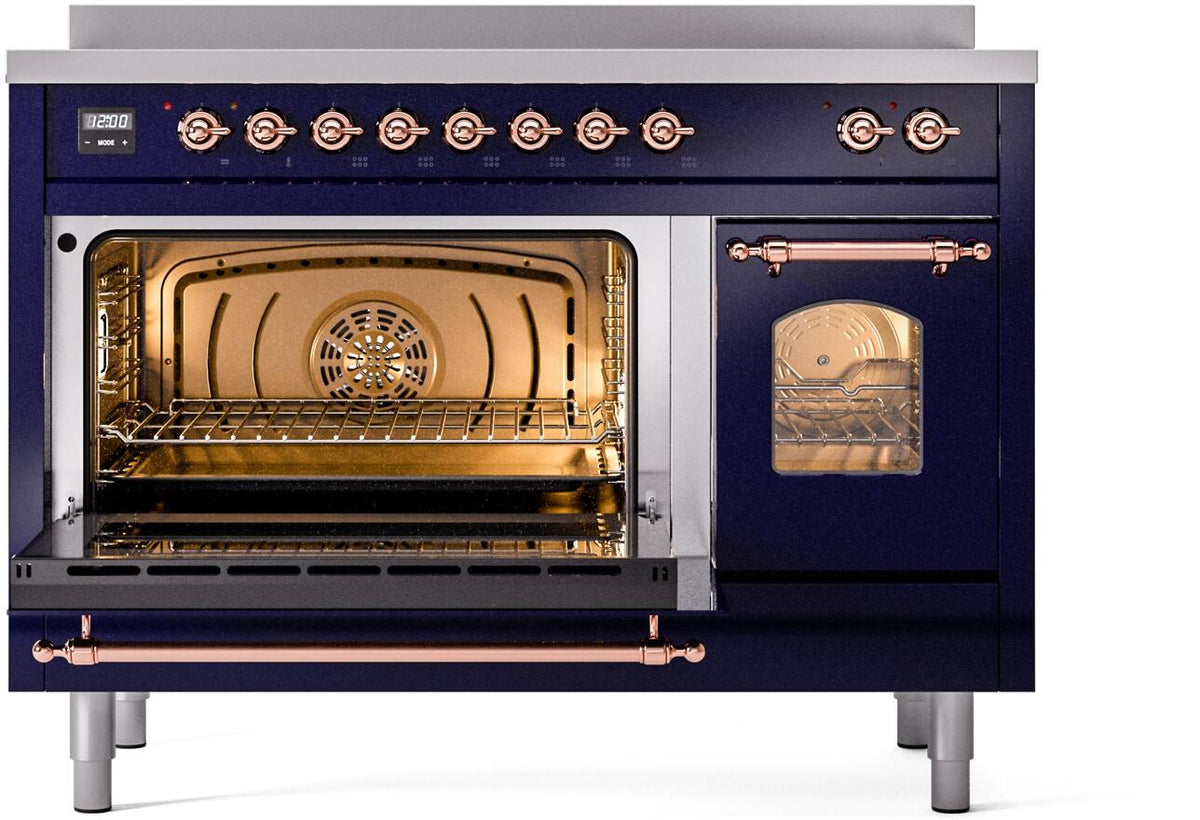 Midnight blue induction range showing open main oven with interior racks and copper trim