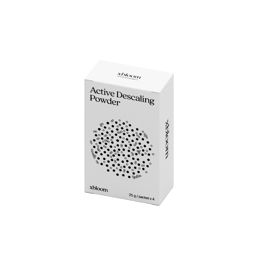 xBloom Active Descaling Powder box, front view with circular droplet graphic