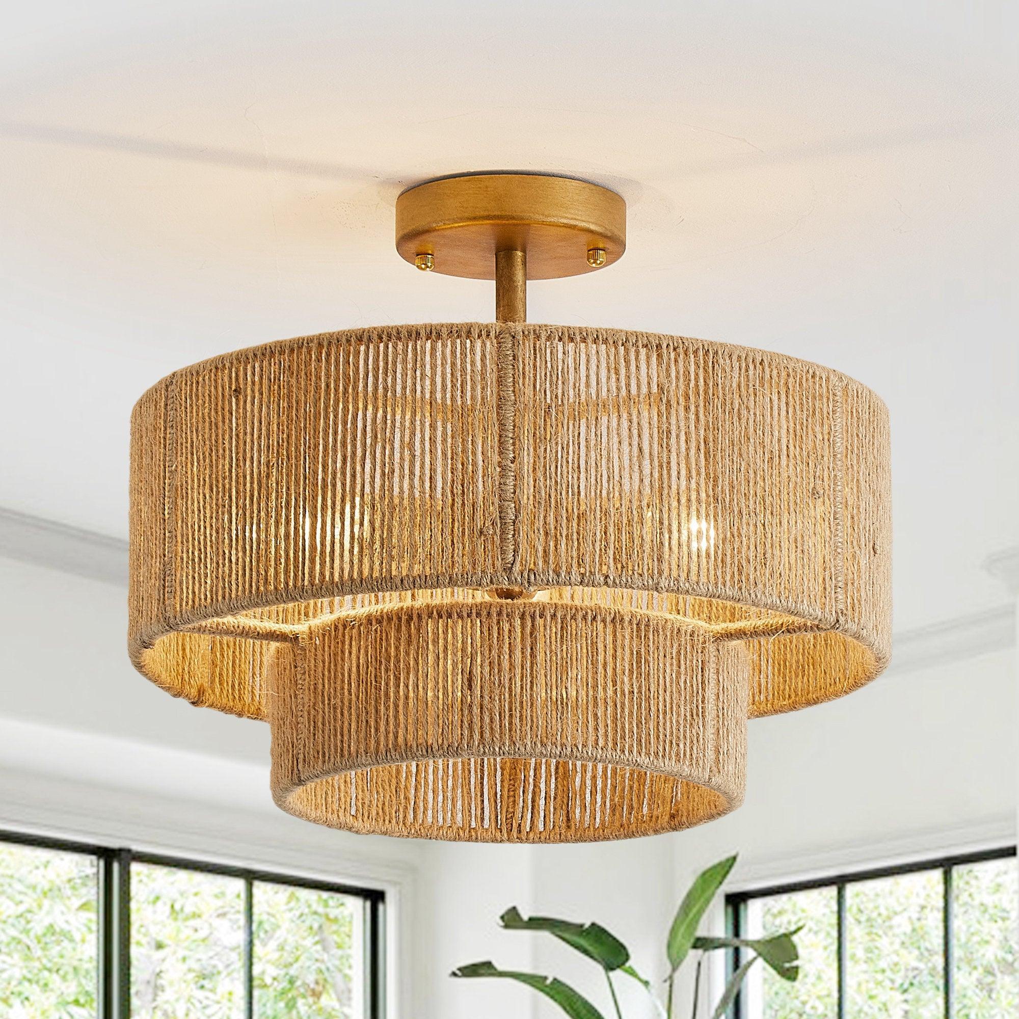 Golden flush mount ceiling light with woven drum shade and antique-style central tube.