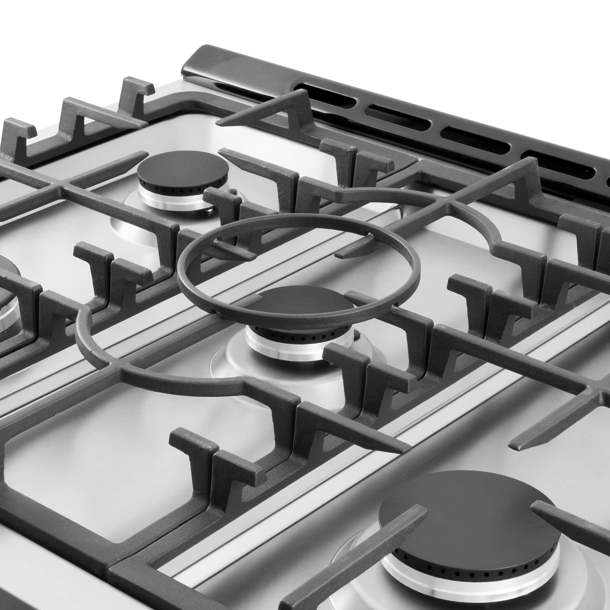 Close-up of stainless steel gas cooktop burner caps and grates