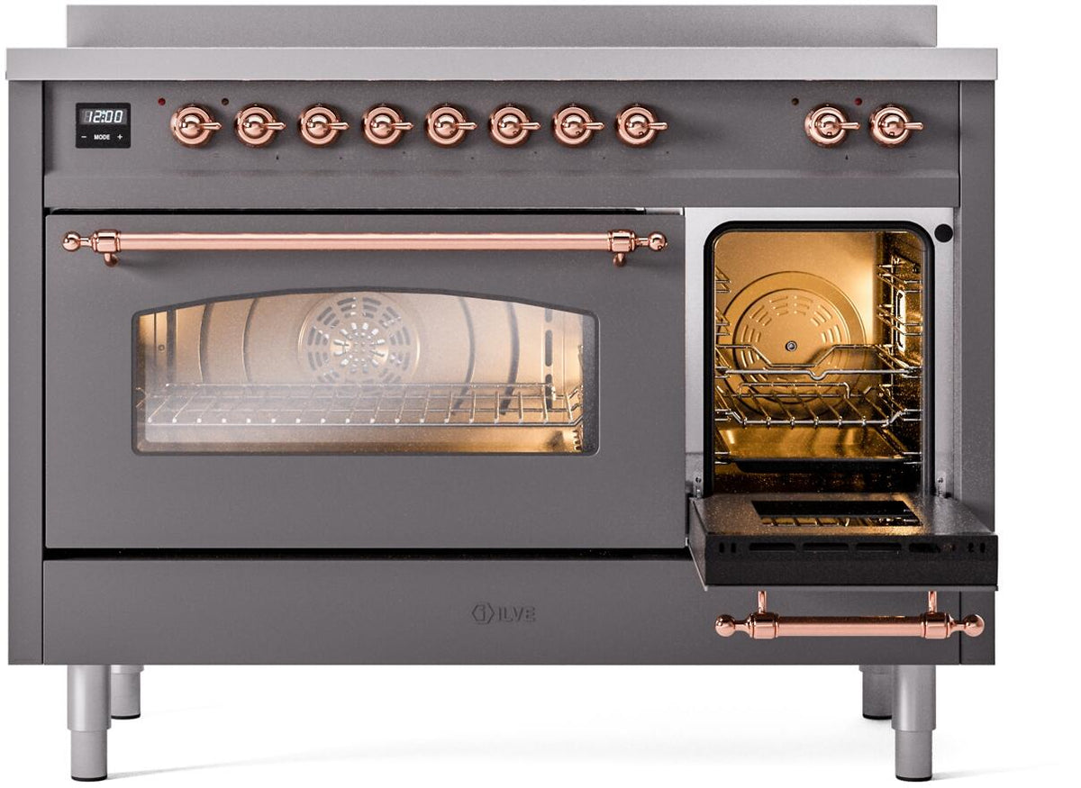Freestanding electric induction range right oven open with racks, copper handle and trim