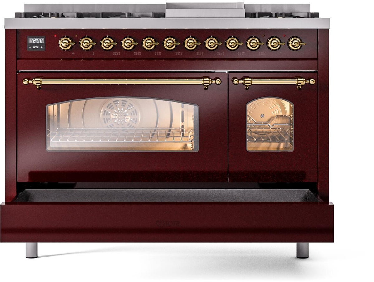 Burgundy dual fuel range front with open lower drawer and brass control rail