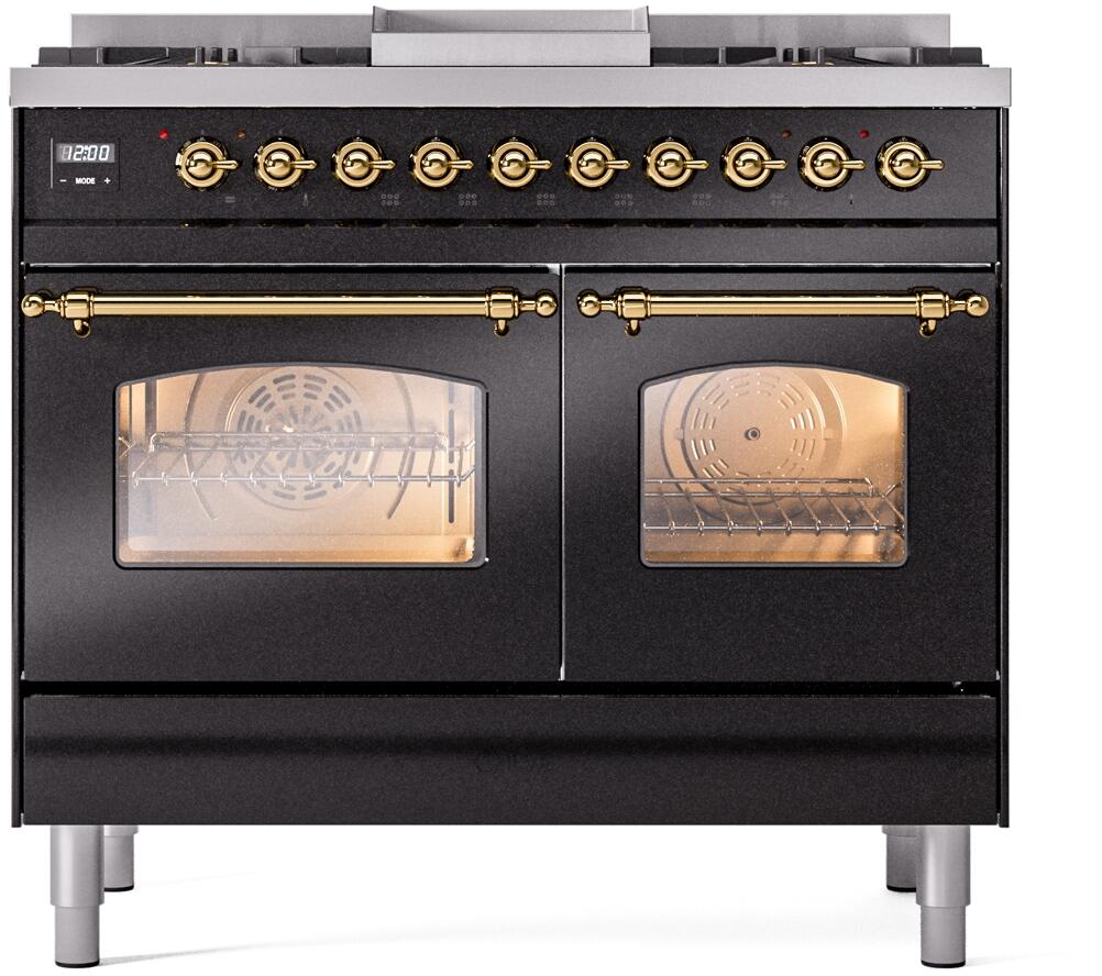 Glossy black dual fuel freestanding range with brass trim, two oven doors, control knobs.