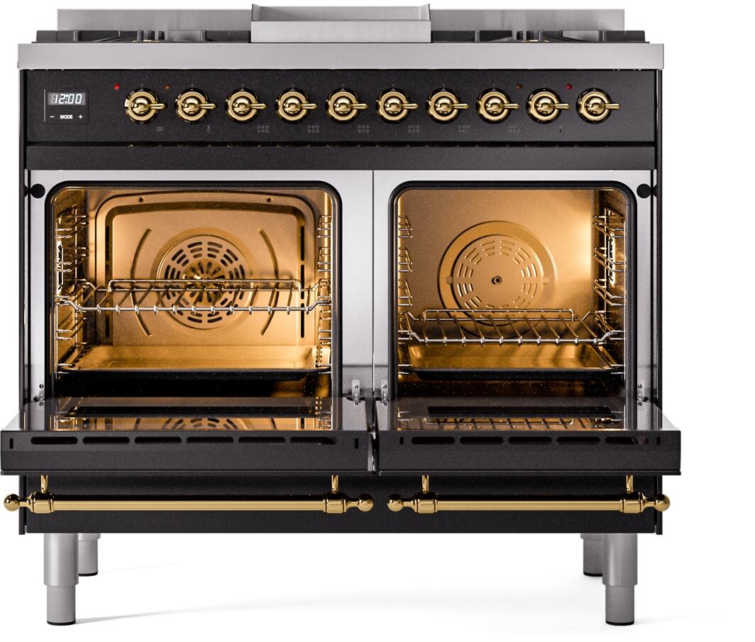 Glossy black dual fuel range with open ovens showing brass racks and interior burners.