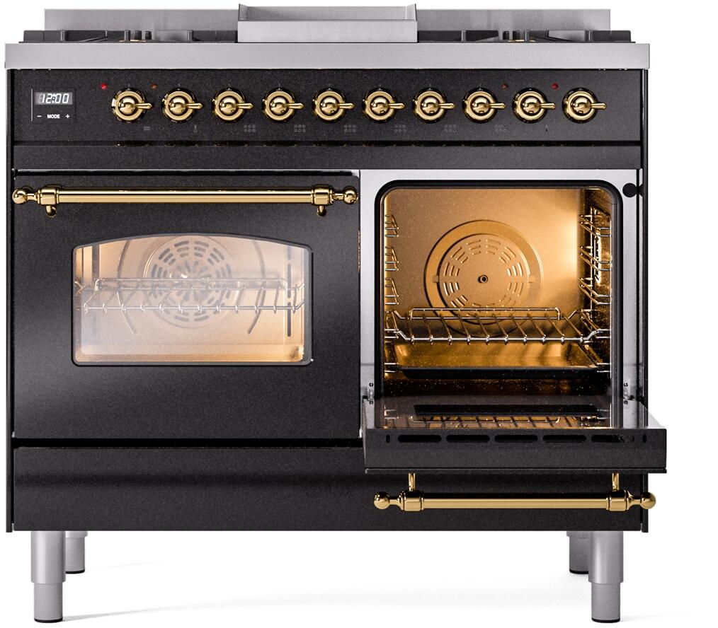 Glossy black dual fuel range with open oven and right glass door window; brass handle.