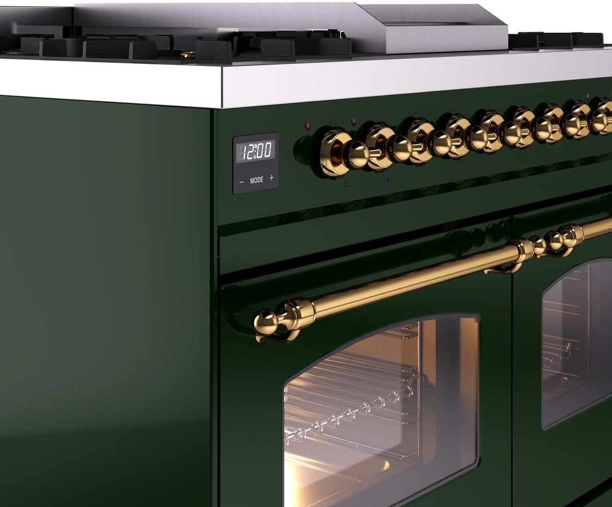 Close-up of emerald green dual fuel range control knobs and brass front handle bar