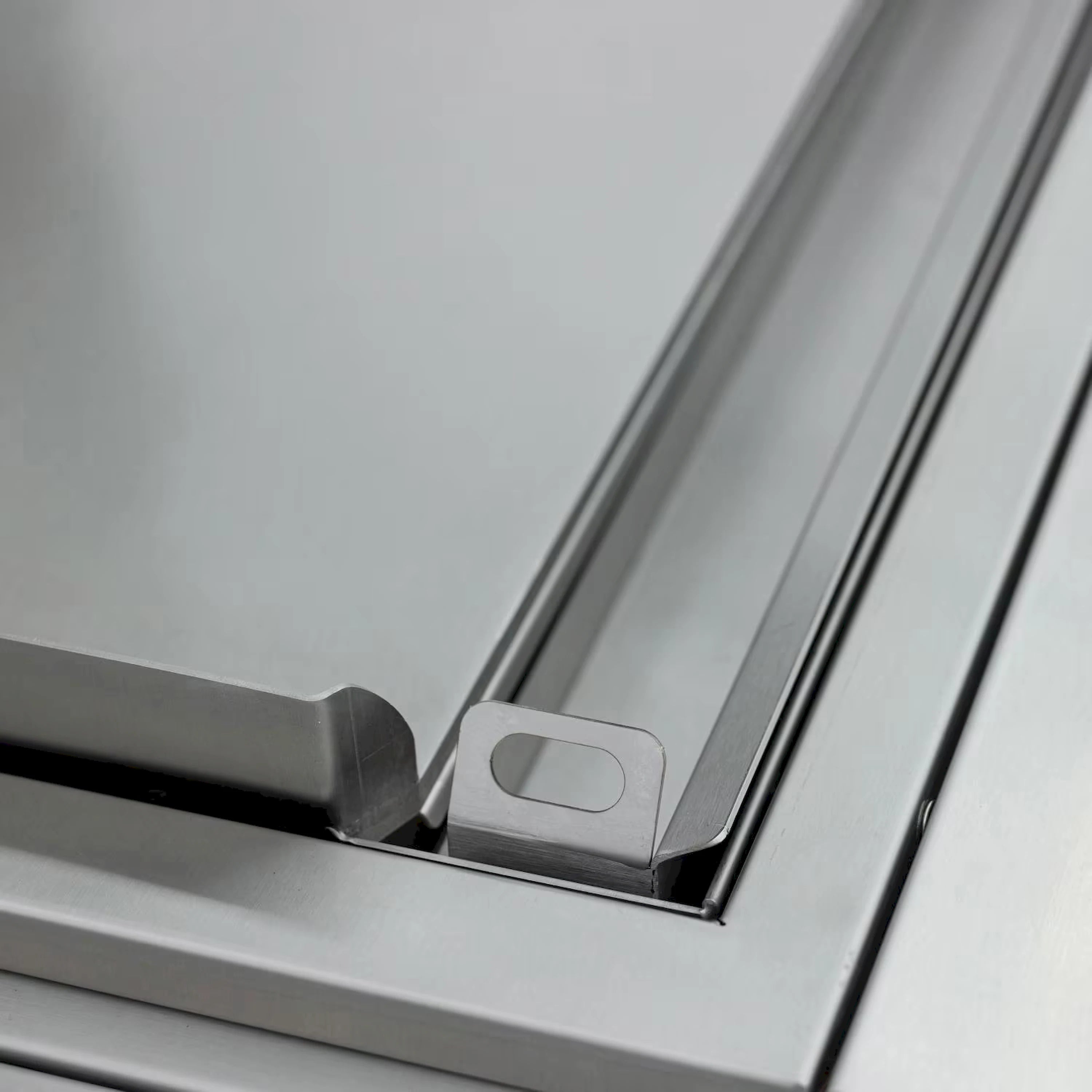 Stainless steel griddle drip tray with front slot and heat shield