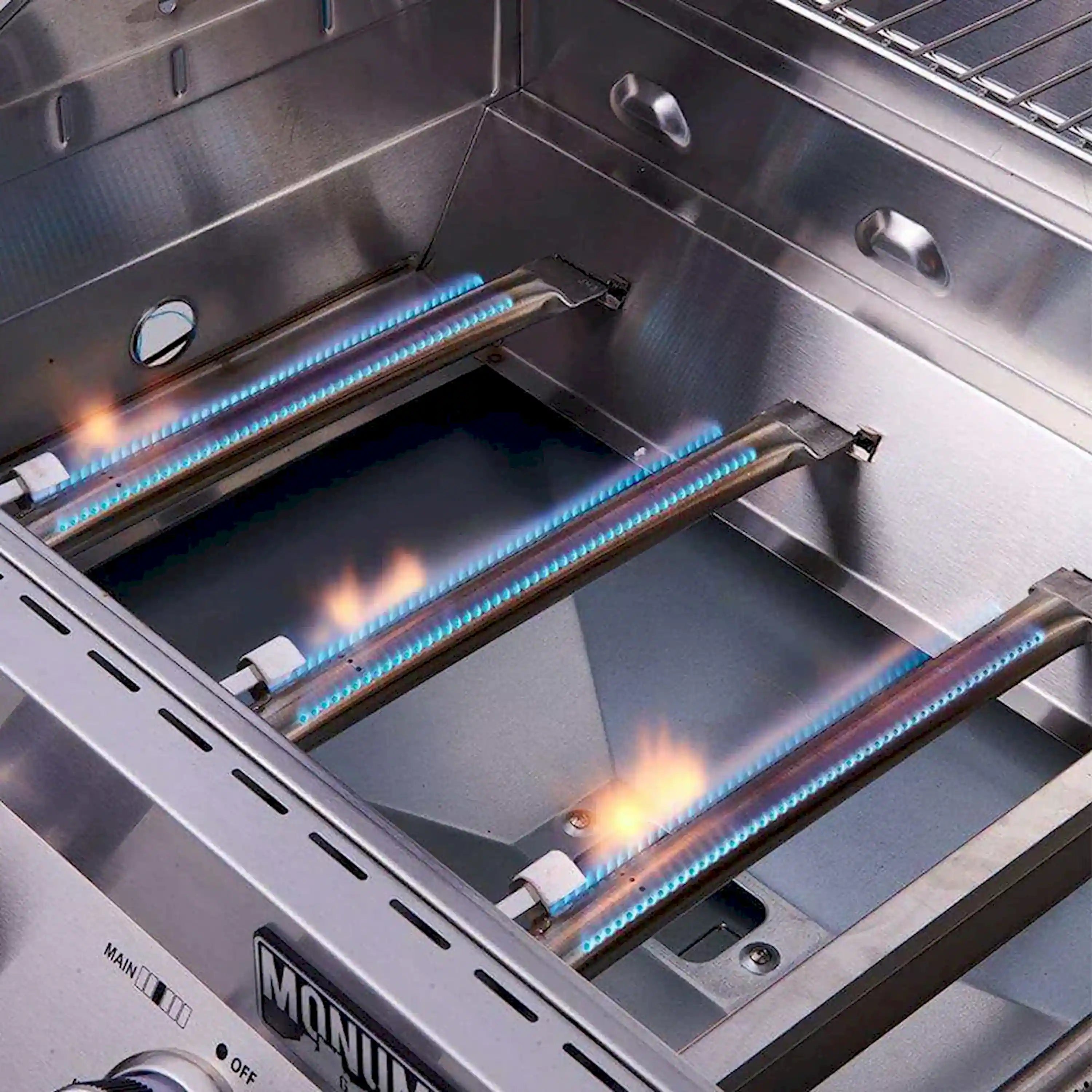 Infrared grill burner compartment with blue flames and glowing bars