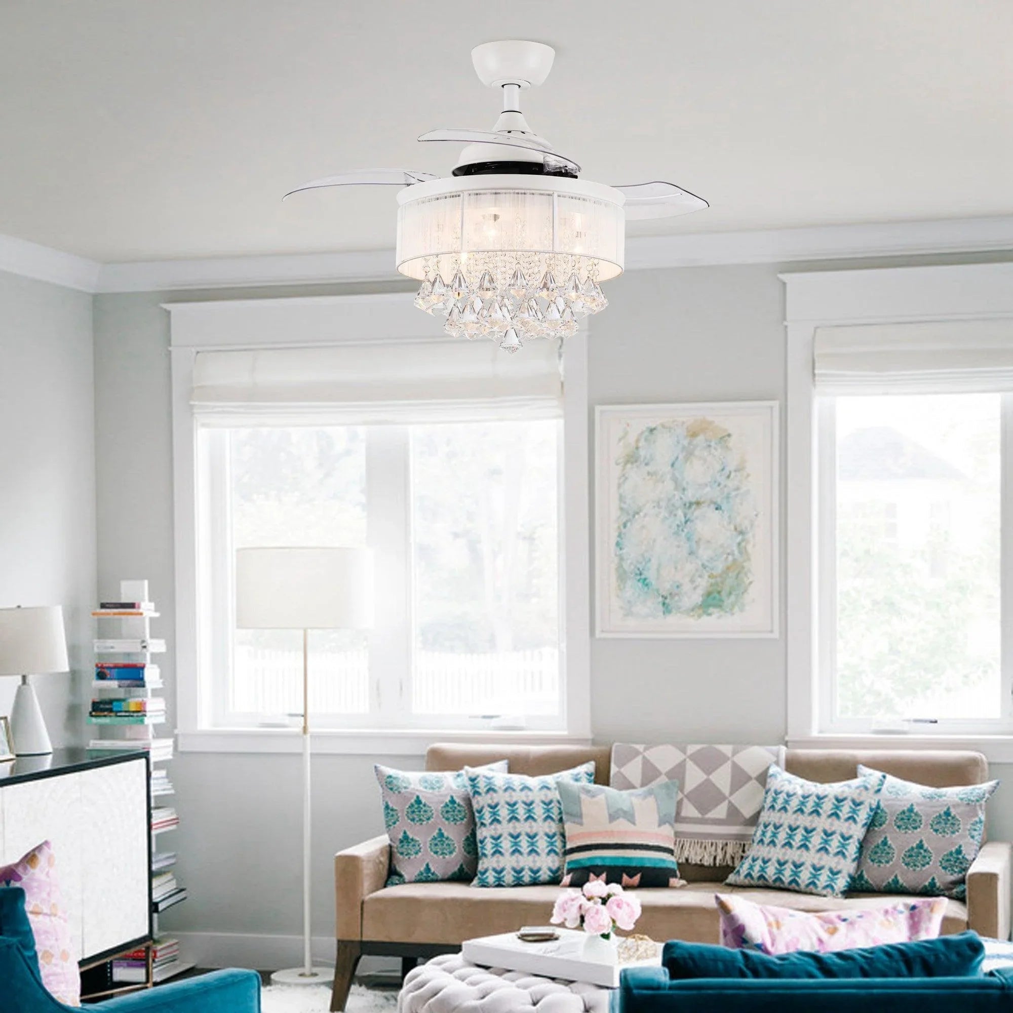 White ceiling fan with chandelier-style crystal light fixture and four blades