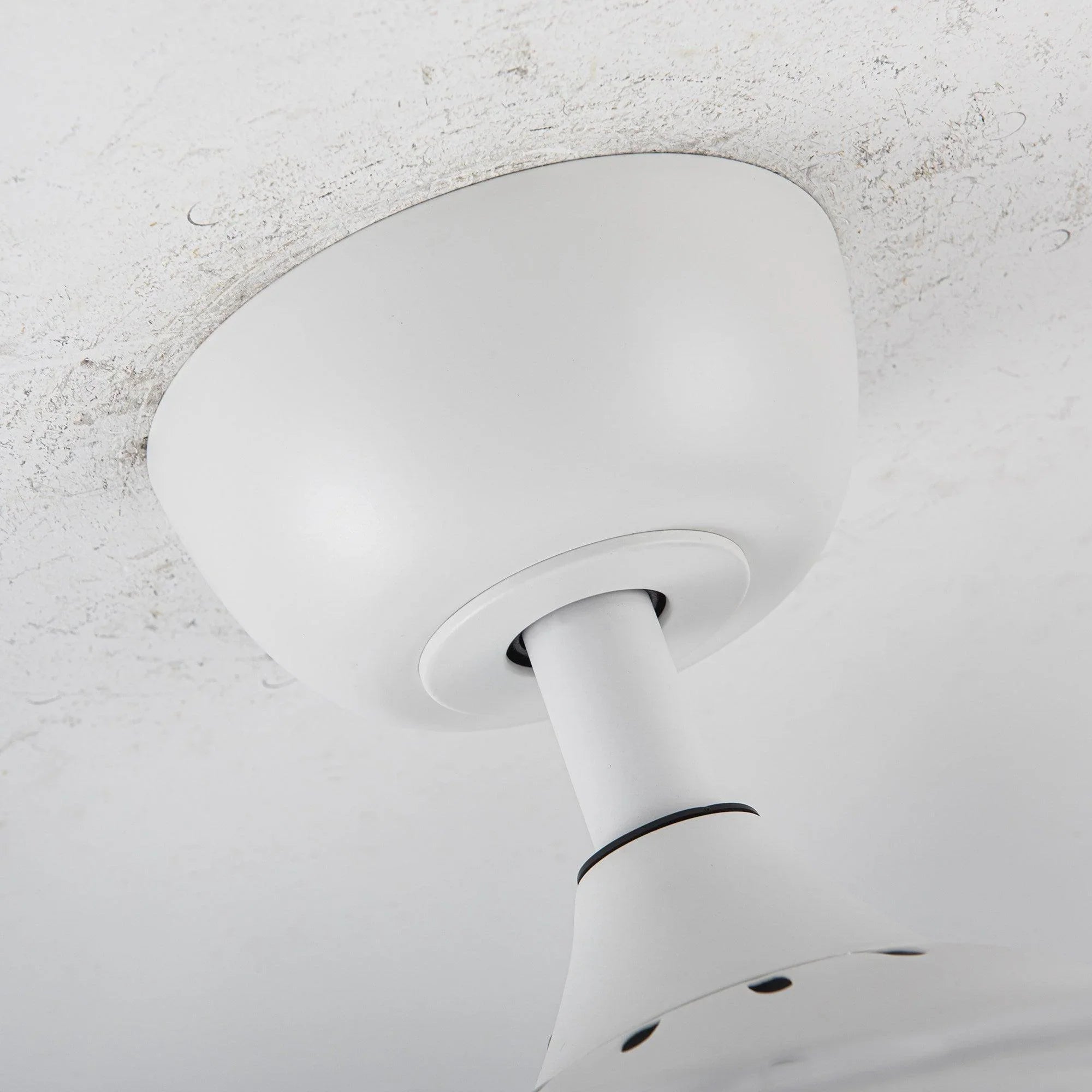 White ceiling fan light fixture with crystal shade and clear blade housing