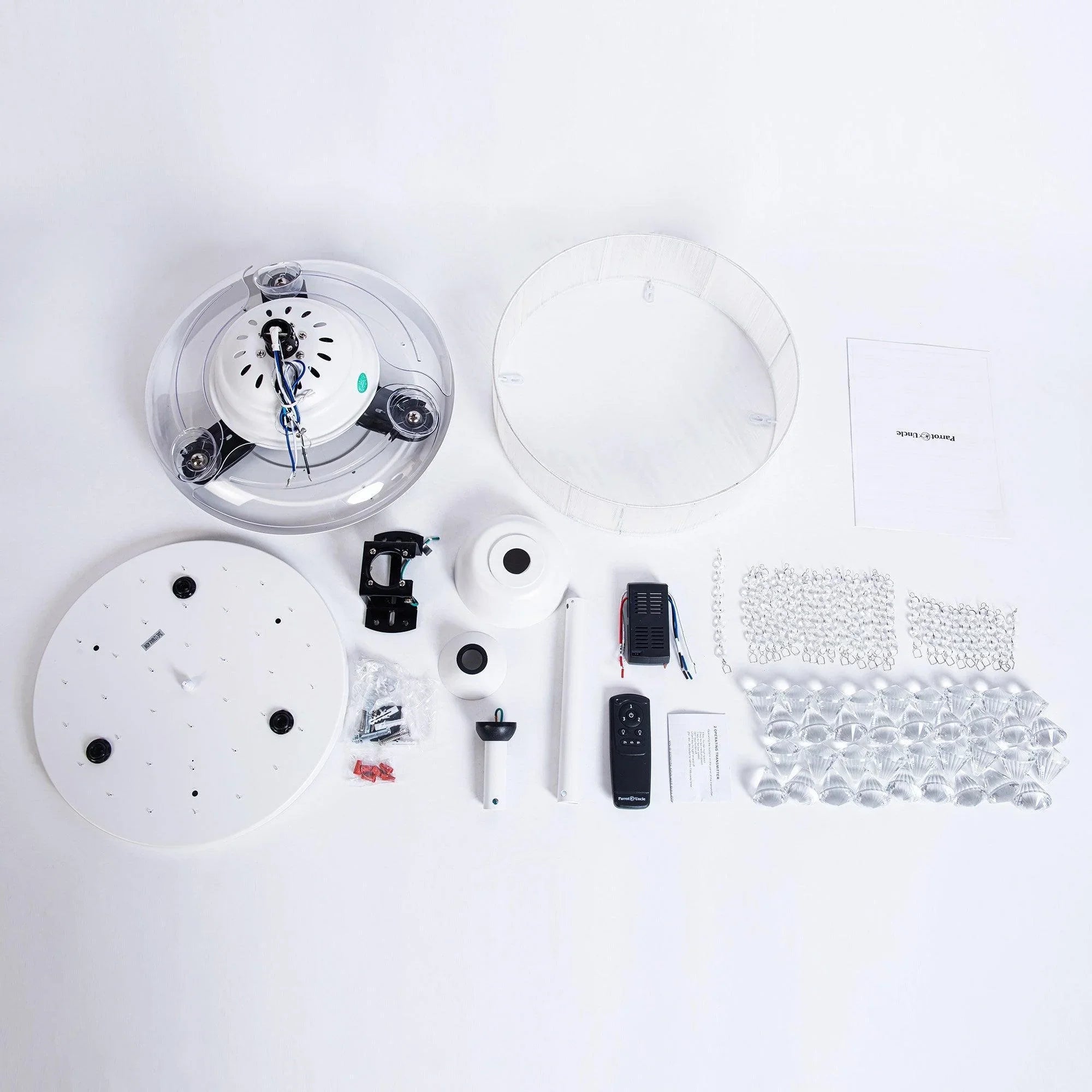 Ceiling fan light kit with crystal shade, mounting parts, and remote control