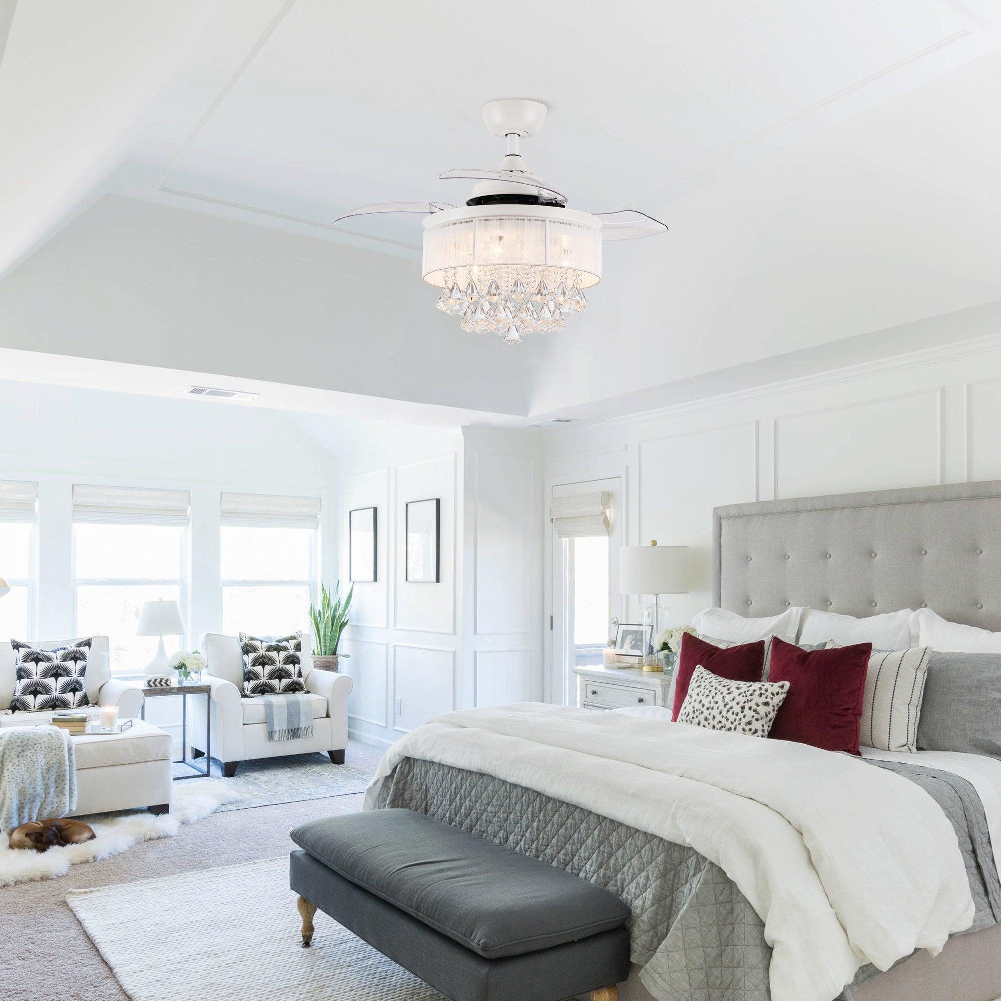 White ceiling fan with glass-crystal light shade and four fan blades