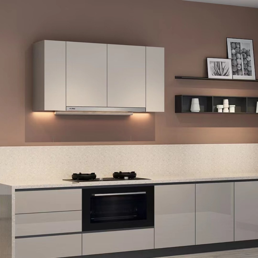 Stainless under-cabinet insert range hood with illuminated underside under cabinets