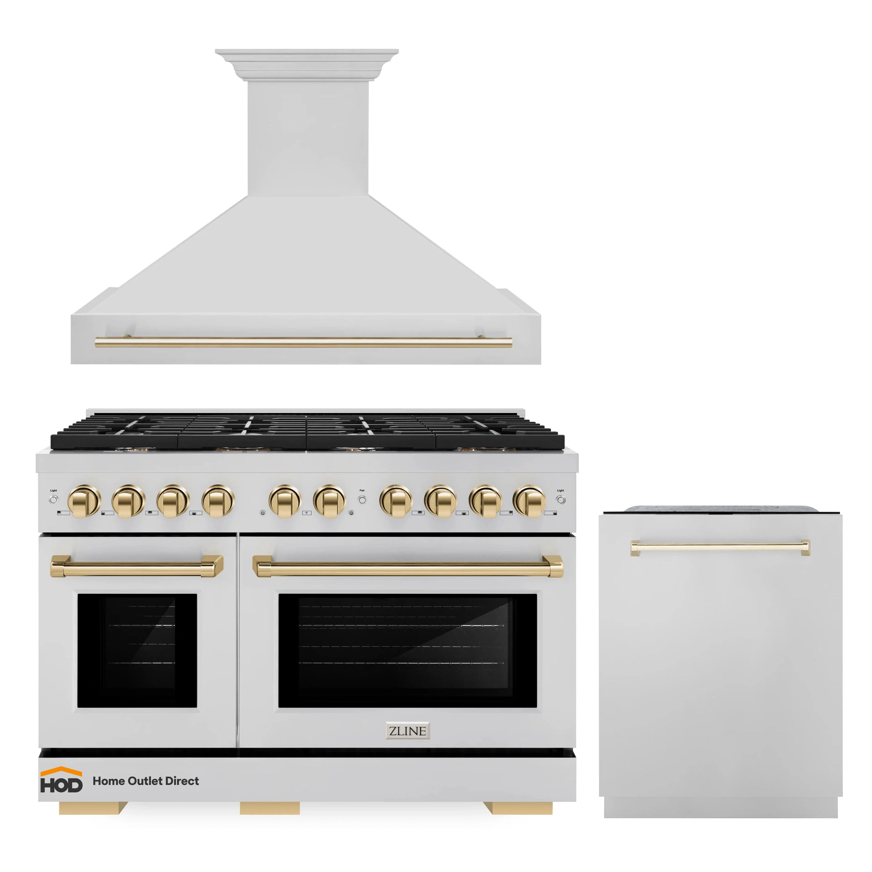 Stainless gas range with wall hood and tall tub dishwasher, gold accents