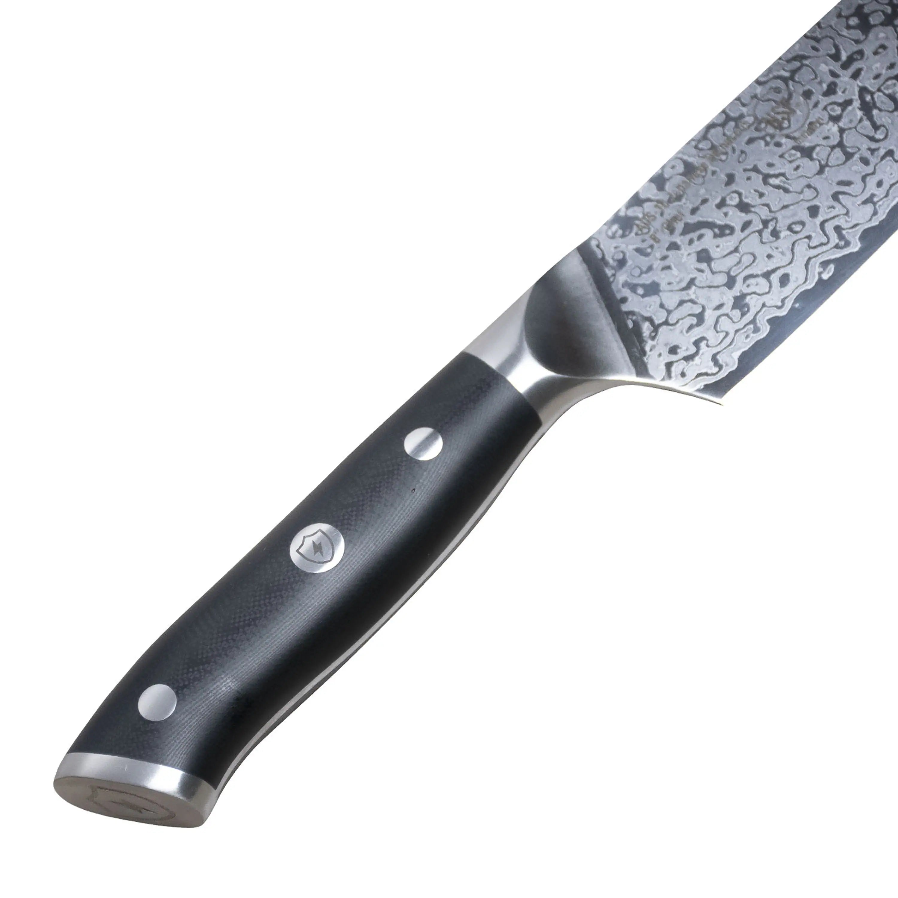 Damascus chef knife with black textured handle and patterned silver blade