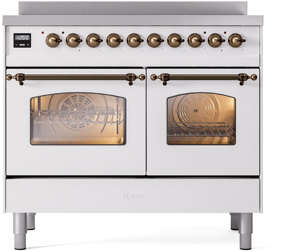 White freestanding induction range with bronze knobs and two glass oven doors