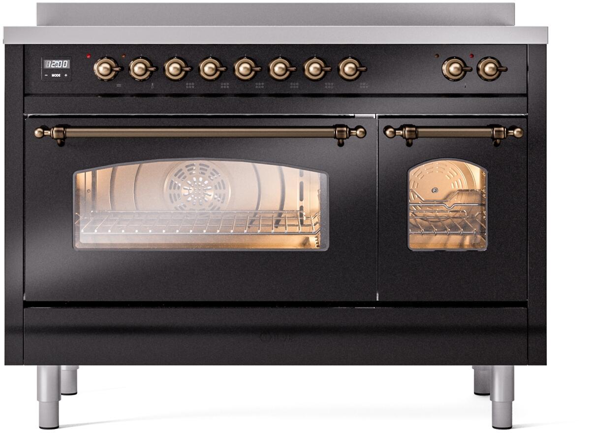 Glossy black freestanding induction range with bronze-trim knobs and dual oven doors