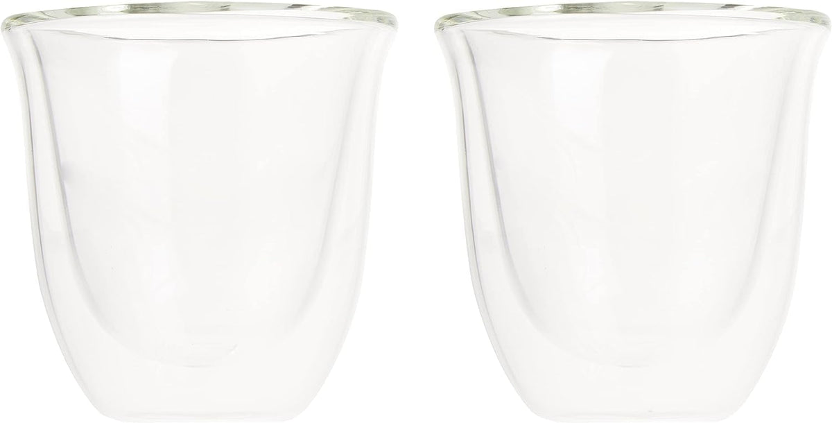 Two clear empty espresso glasses with tulip-shaped sides