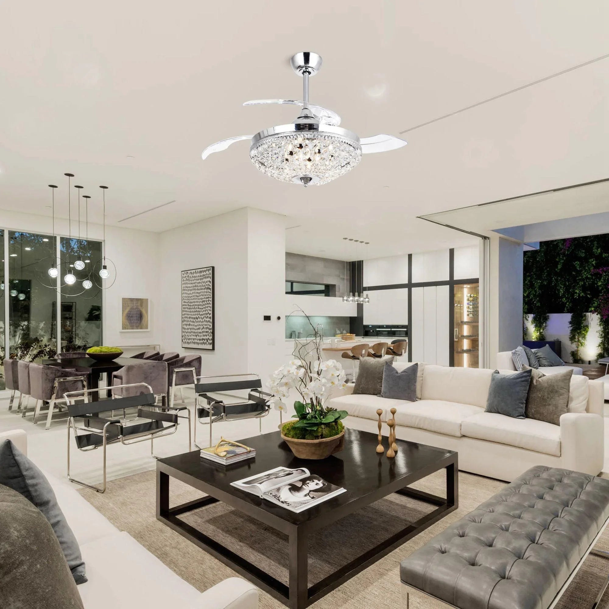 Modern chrome ceiling fan with crystal canopy and bright light glow