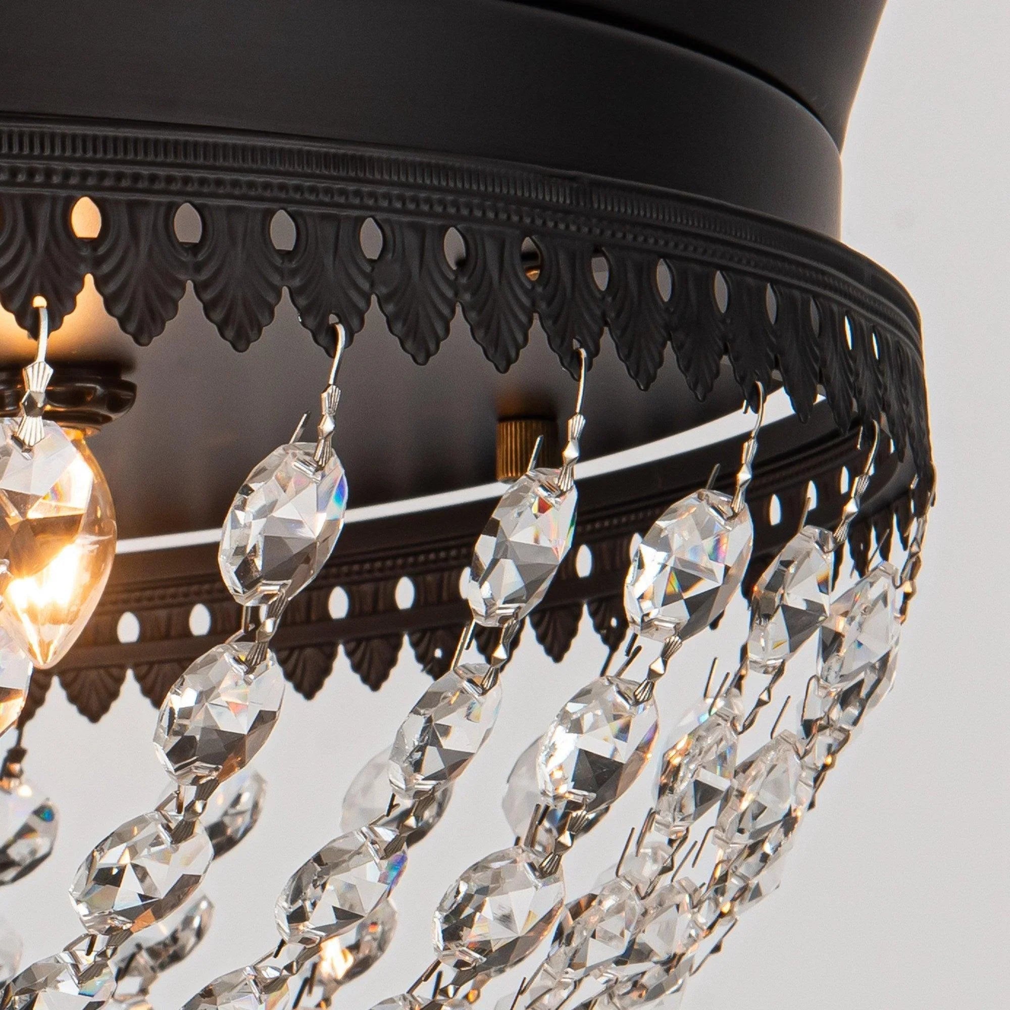 Black modern ceiling fan with crystal bead strands around the light fixture