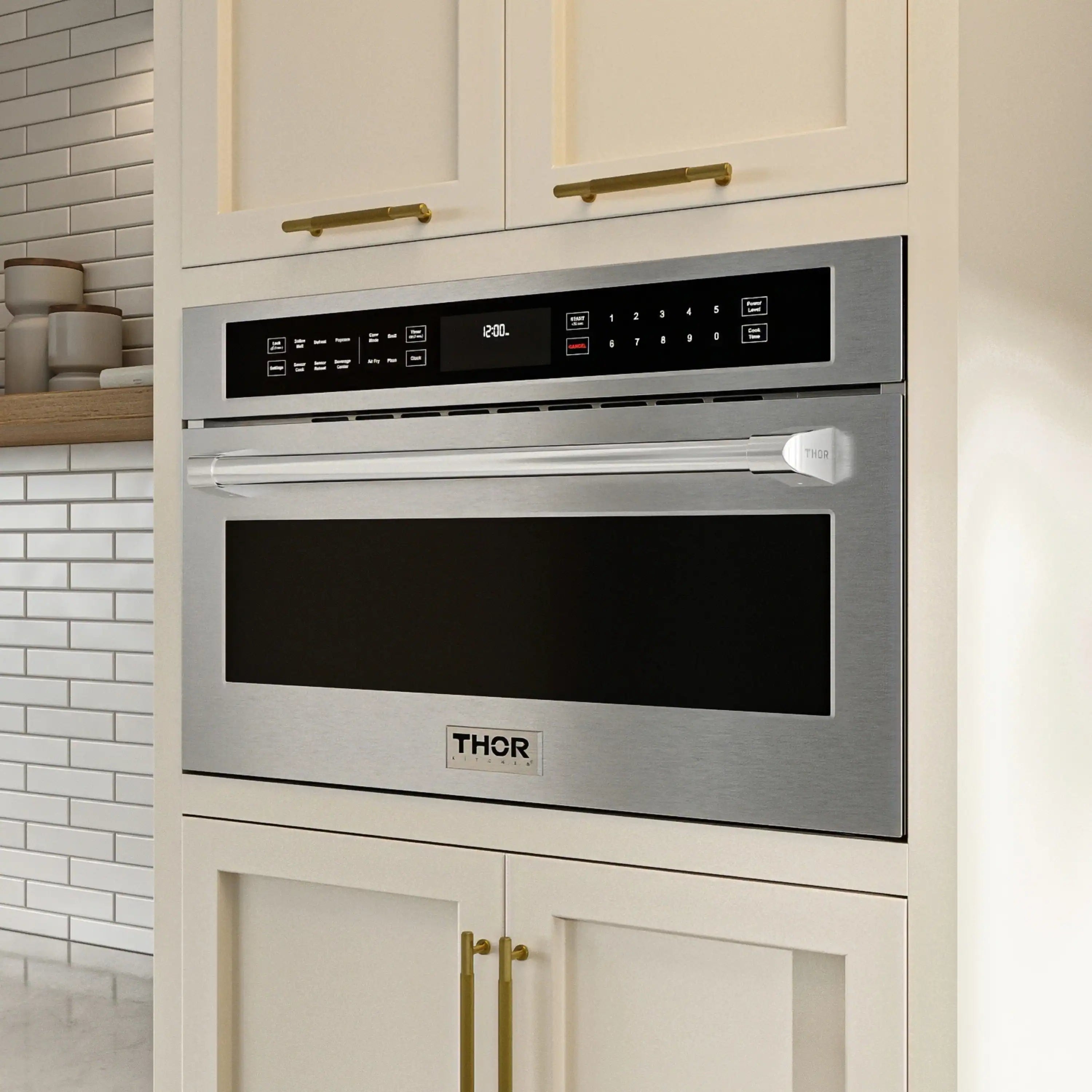 Built-in stainless microwave oven with drop-down door and black display control panel.