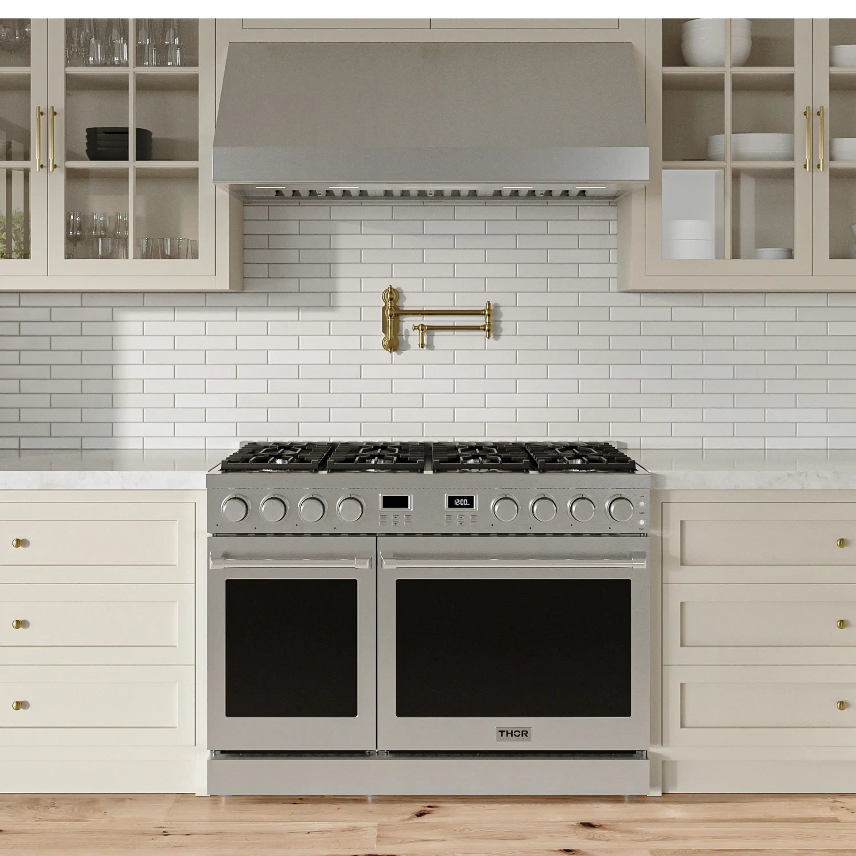 Stainless steel pro-style gas range with six-burner cooktop and two black oven doors