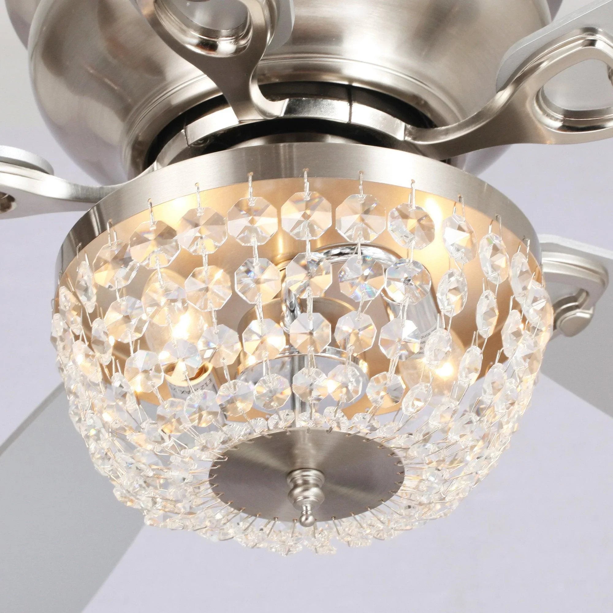 Flush mount ceiling fan with clear crystal light globe and brushed metal housing