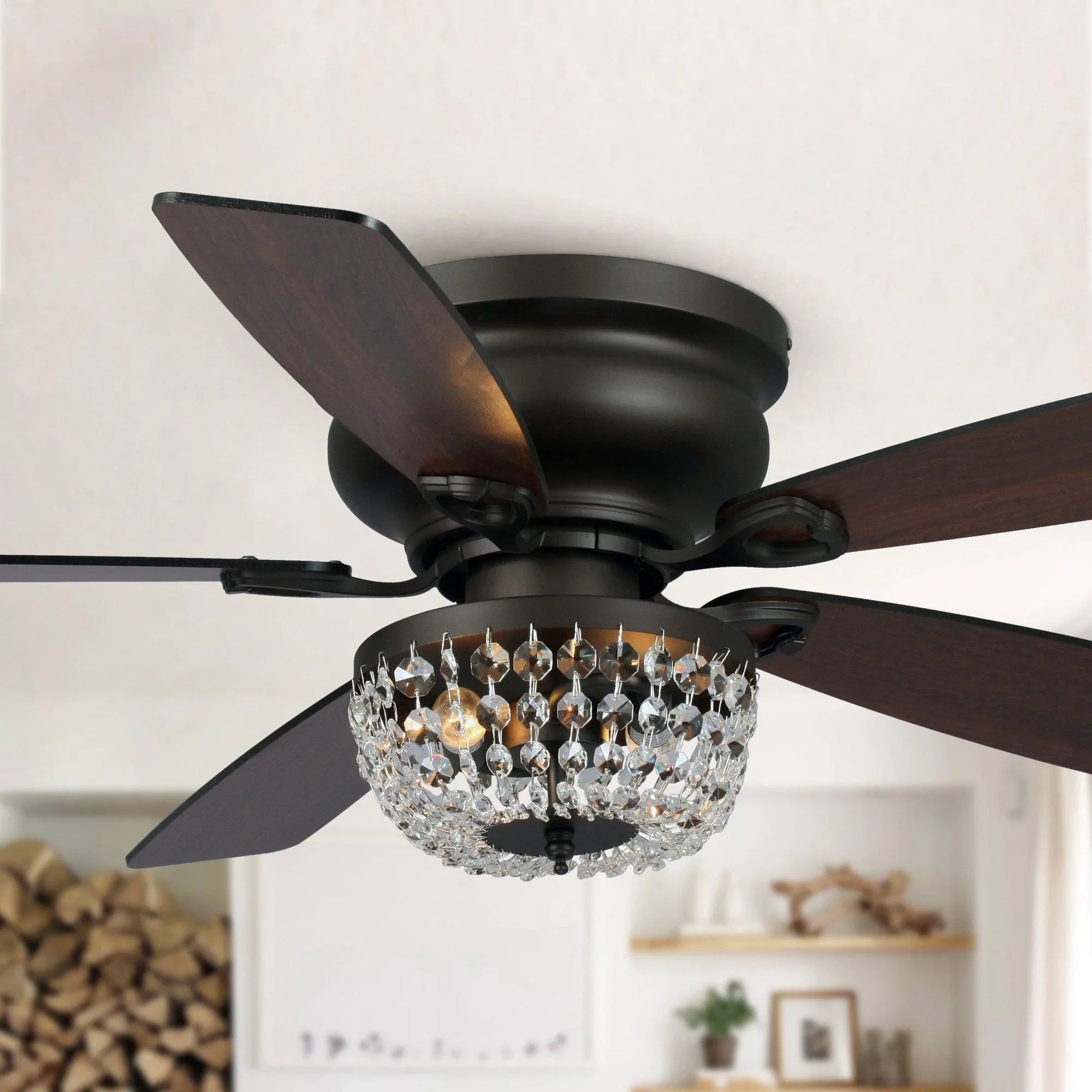 Flush mount ceiling fan with crystal chandelier-style shade and dark blades