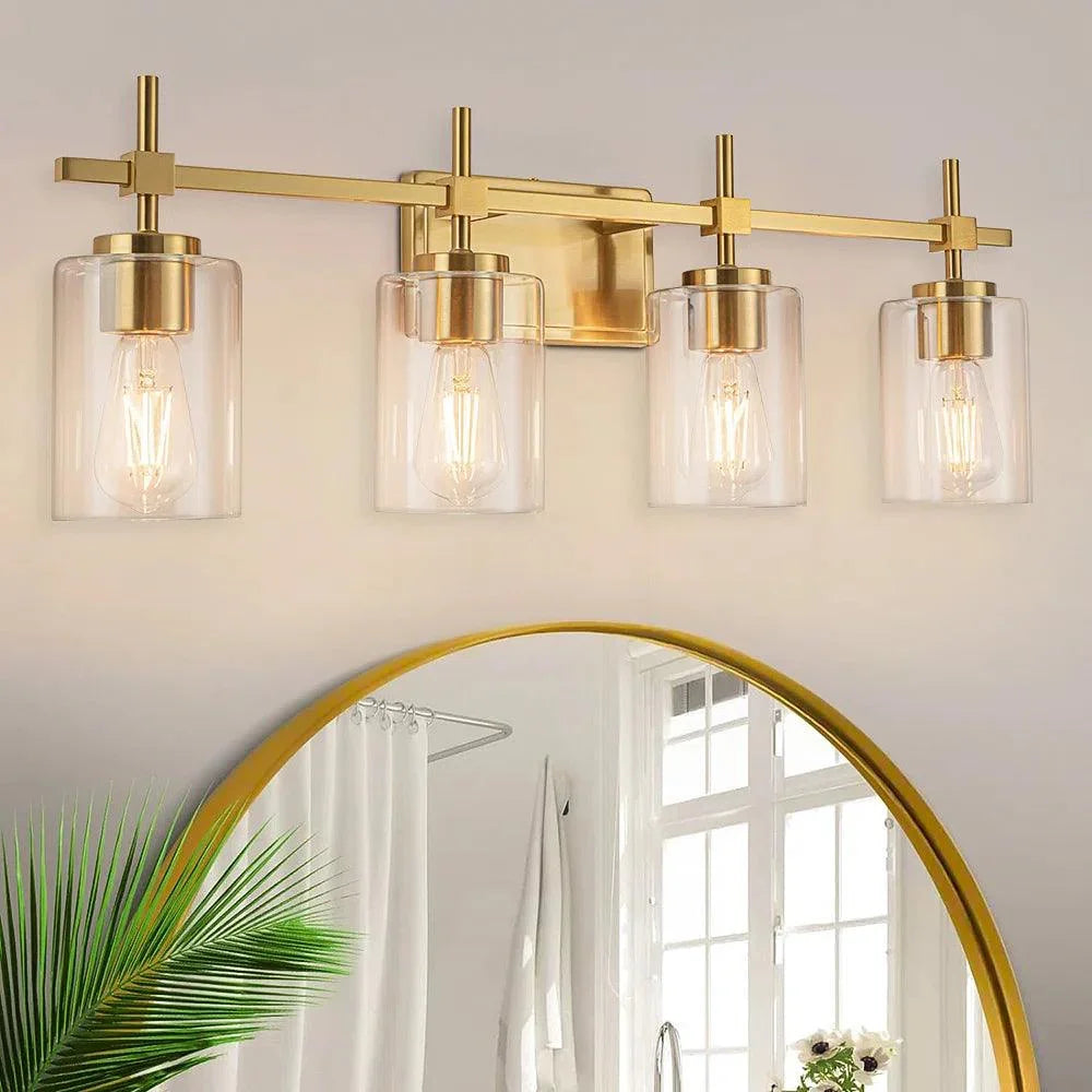 Golden 4-light bathroom vanity light with clear glass shades and reflective metal frame